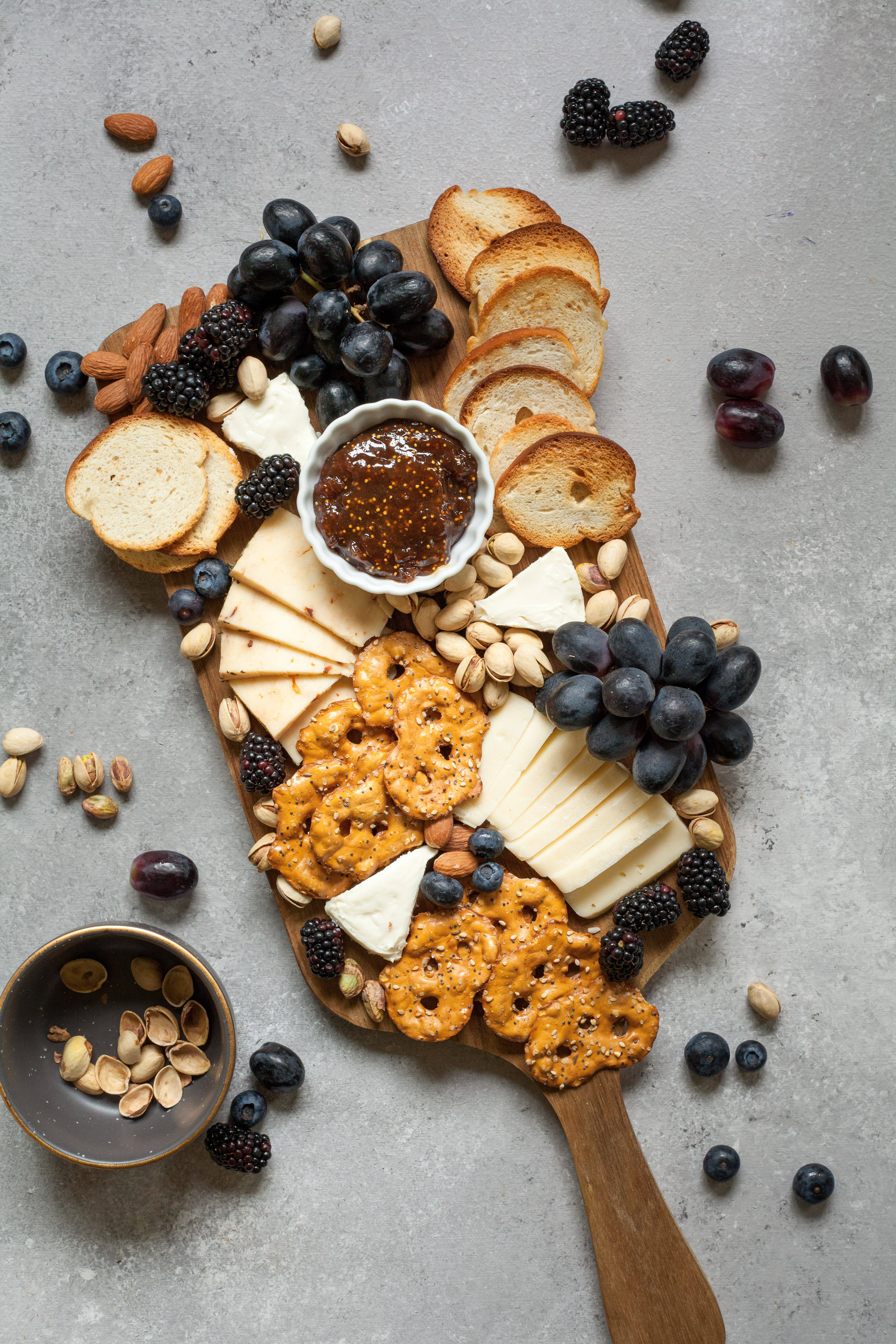 rustic wooden board, assorted cheeses, grapes, 5K Phone Wallpaper