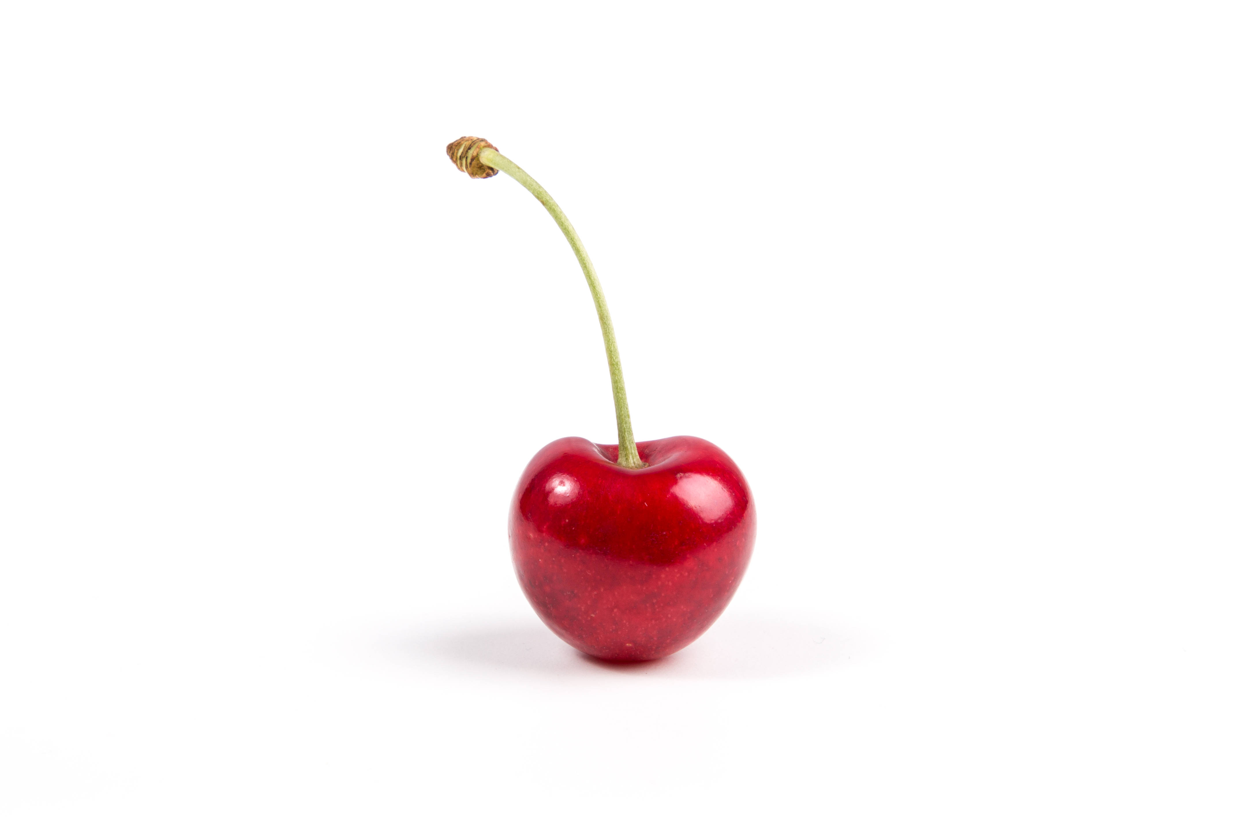 cherry fruit, glossy red, green stem, 4K Desktop Wallpaper