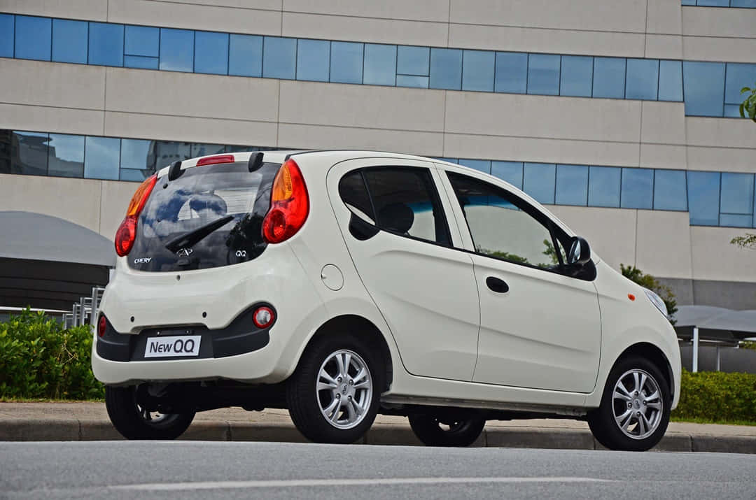 Chery, white compact car, city street, SD Desktop Wallpaper