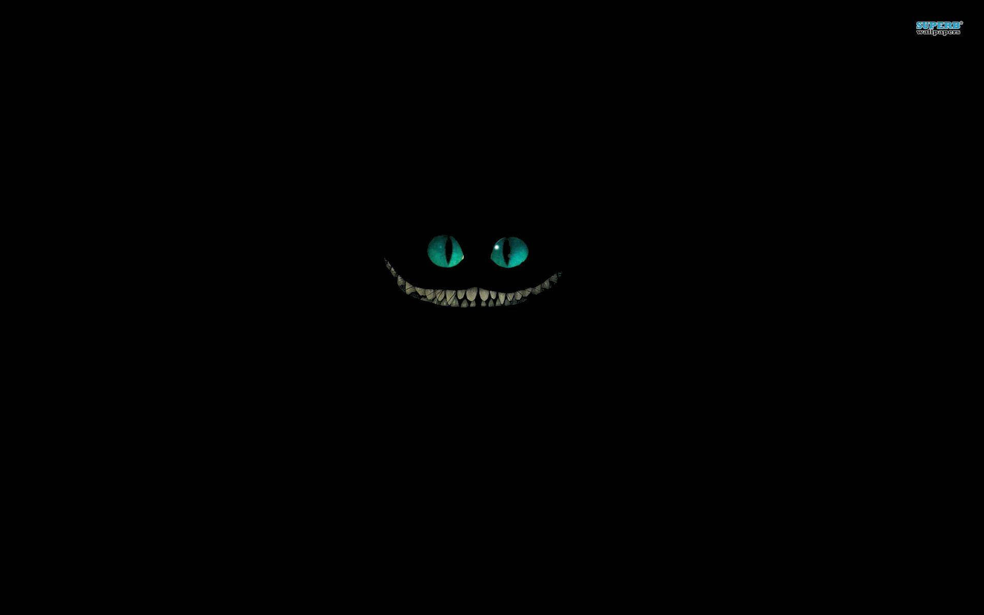 Green Cheshire Cat, glowing green-eyed grin, sharp teeth, Full HD Desktop Wallpaper