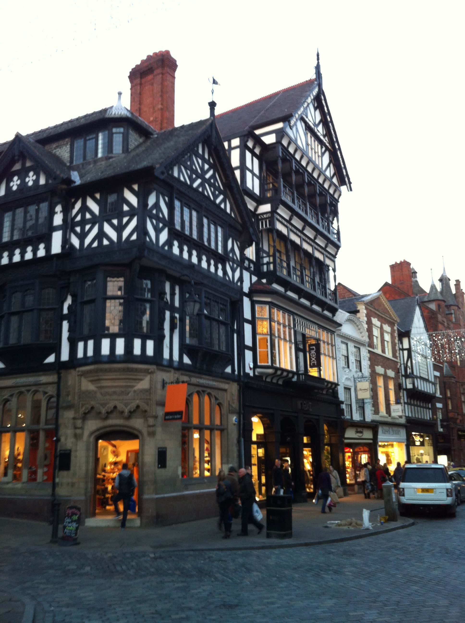 Chester, historic Tudor style buildings, black and white timber-framed building, 2K Phone Wallpaper