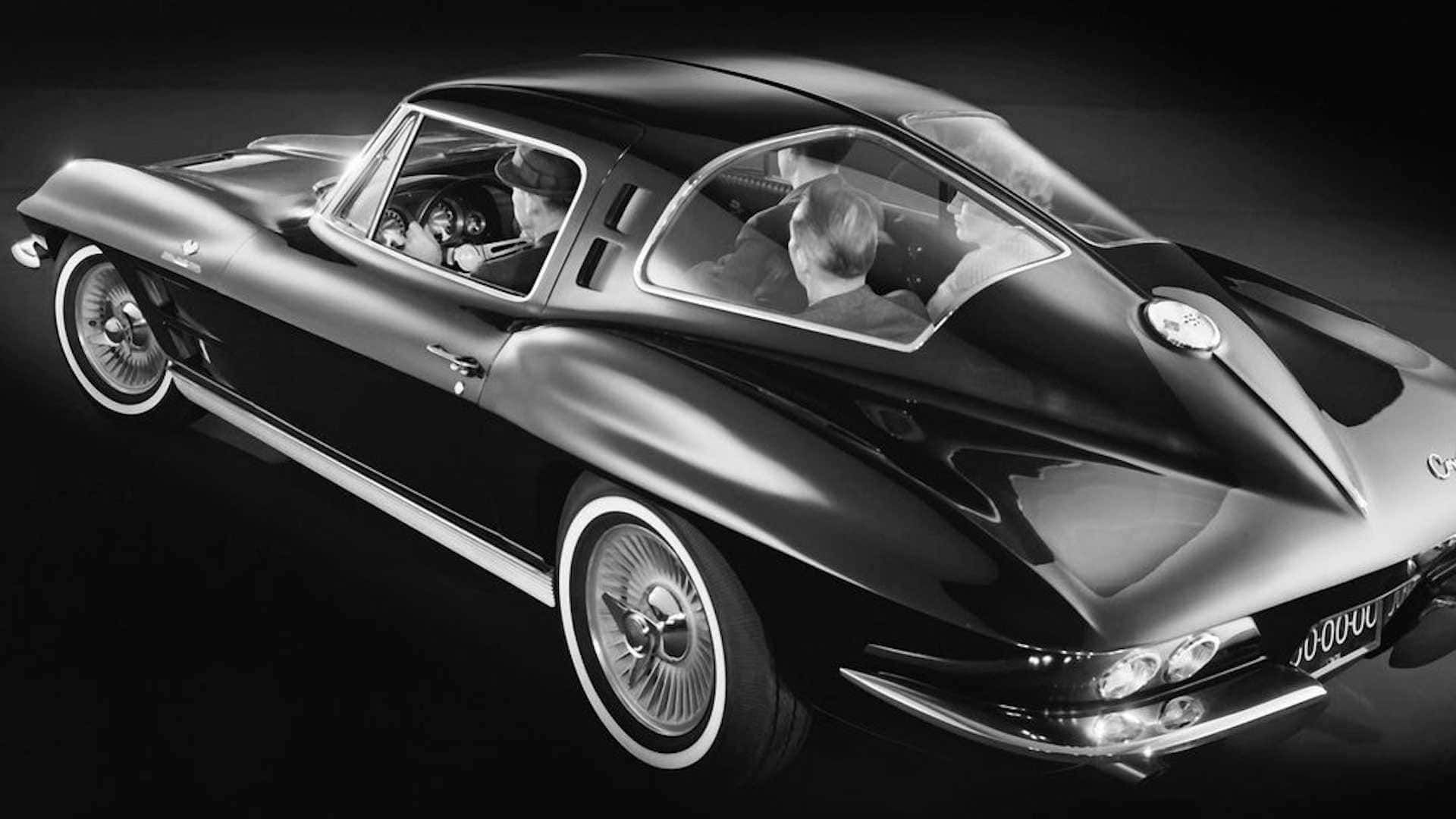 Chevrolet Corvette C2, sleek black, three people inside, Full HD Desktop Wallpaper