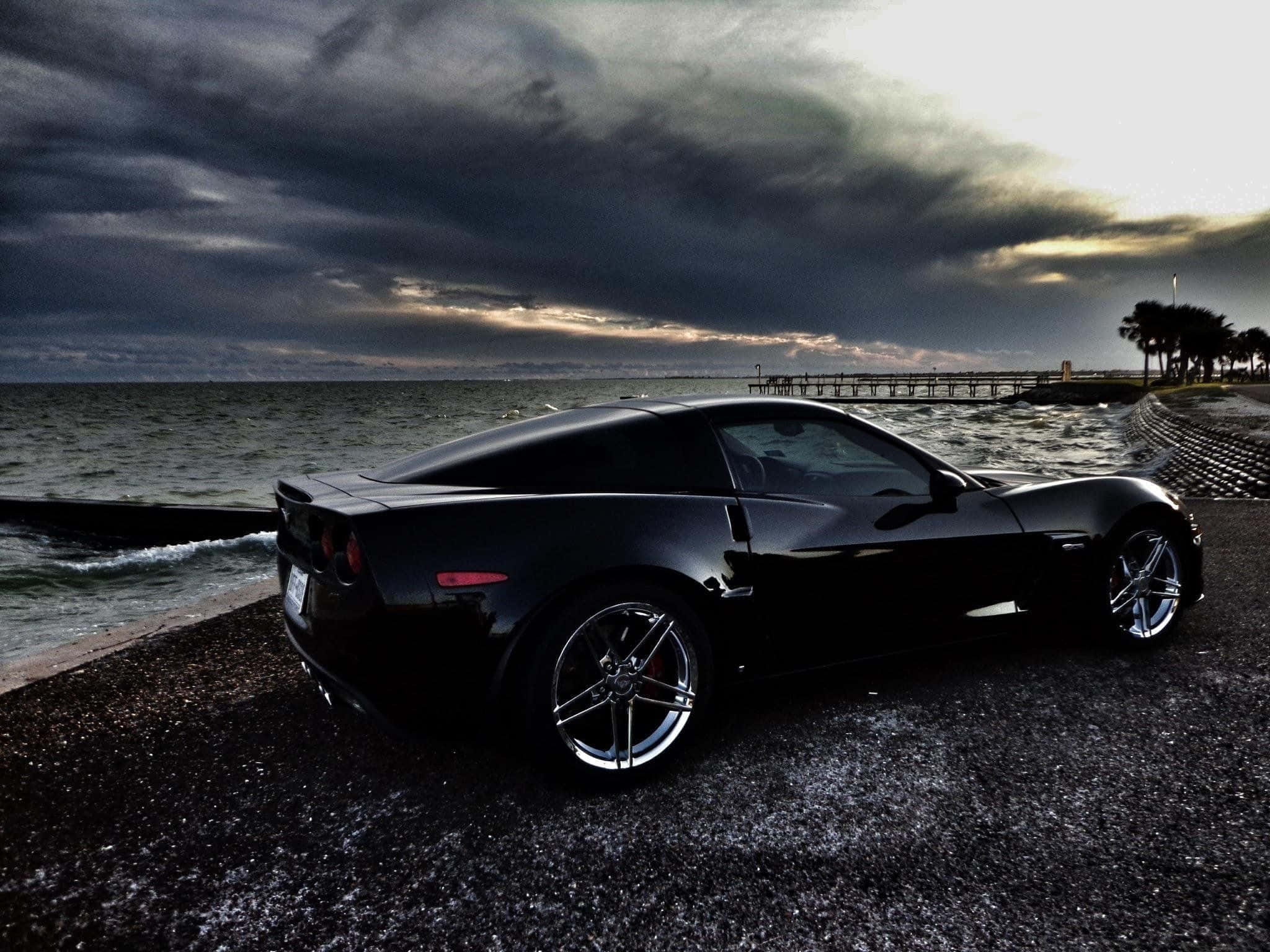 Chevrolet Corvette C6, sleek black sports car, stormy beach, Full HD Desktop Wallpaper