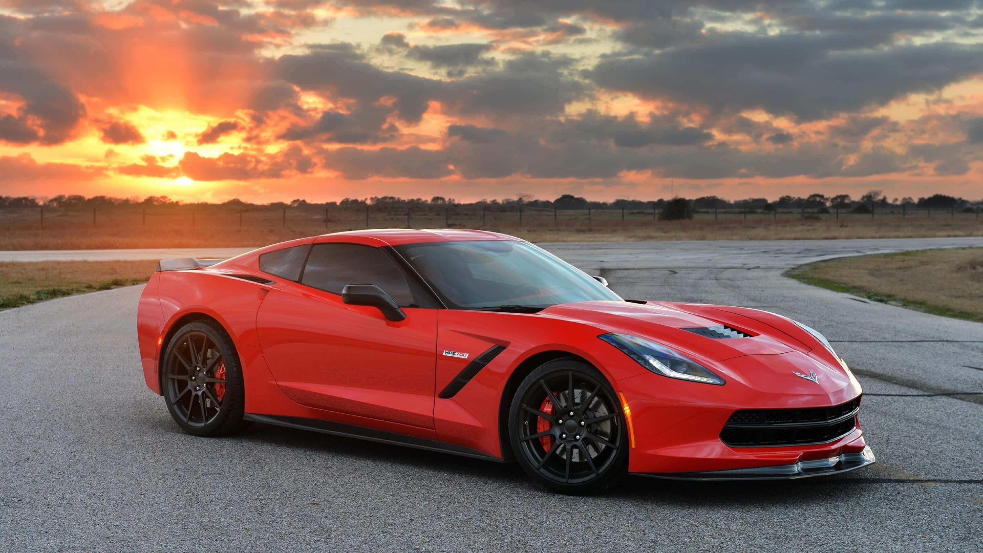 Chevrolet Corvette C7, stunning red, asphalt track, 4K Desktop Wallpaper