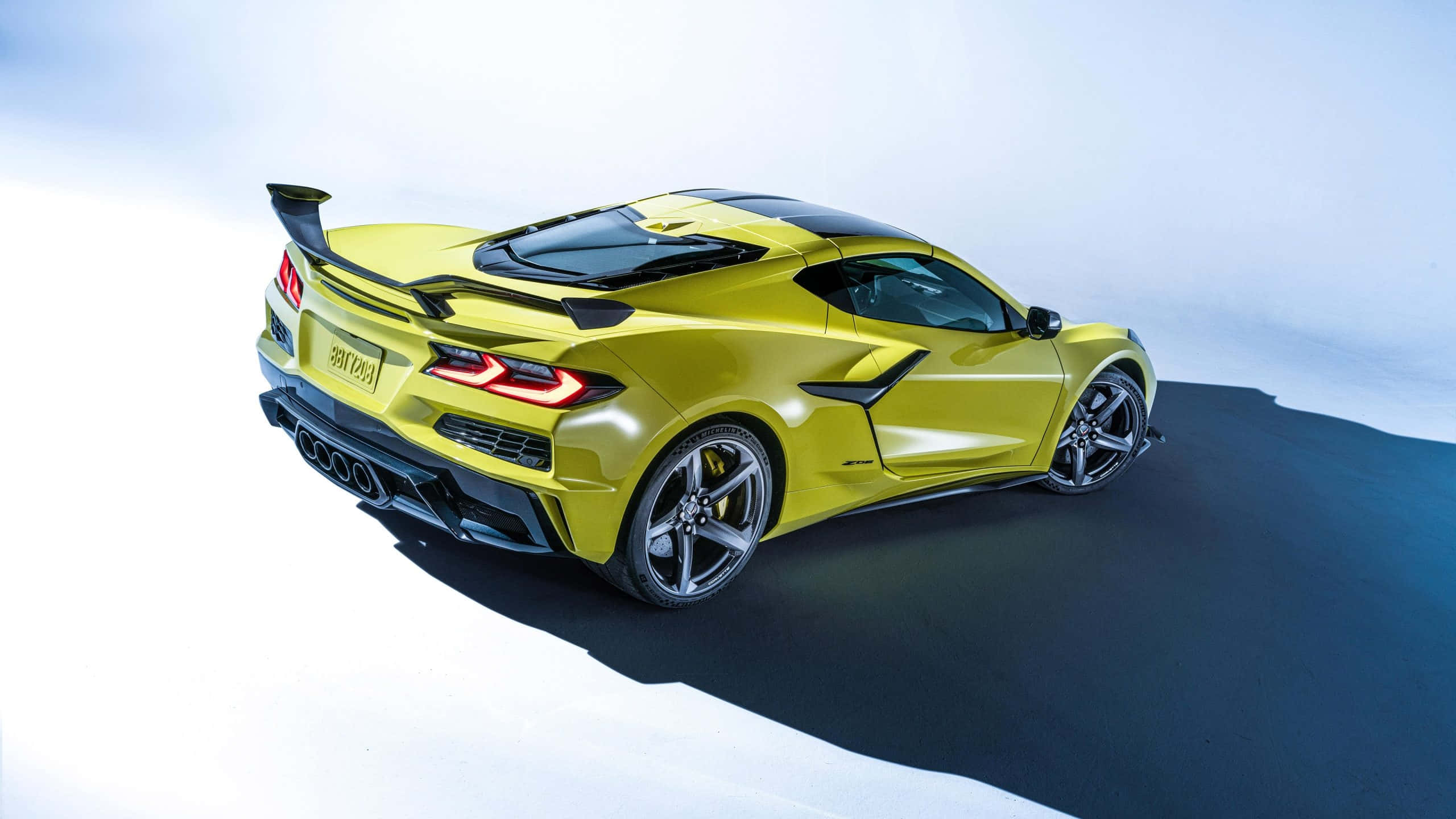 Chevrolet Corvette C8, yellow, rear view, 2K Desktop Wallpaper