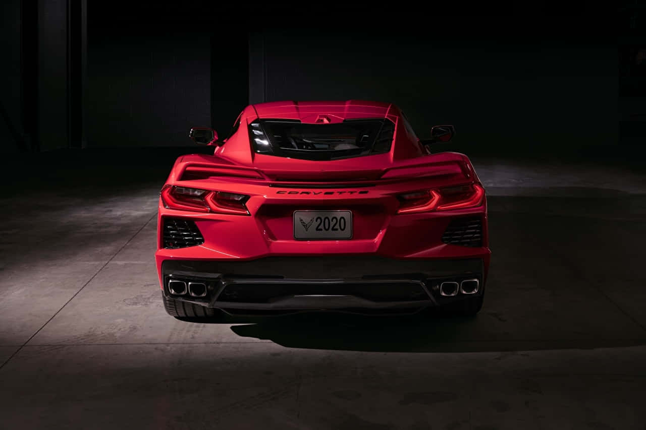 2020 Chevrolet Corvette C8, vibrant red, dark industrial garage, HD Desktop Wallpaper