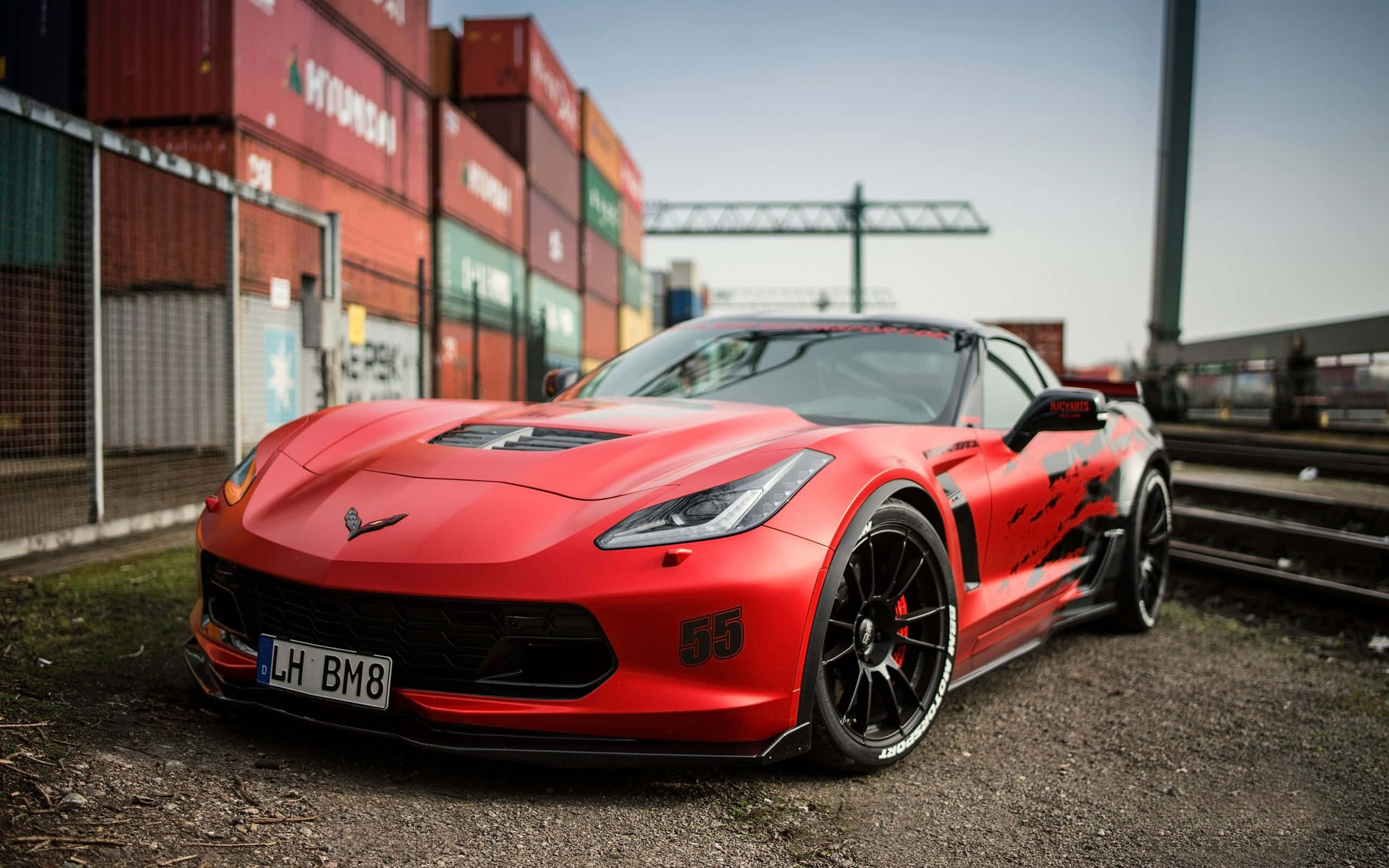 Chevrolet Corvette Z06, vibrant red, black accents, 2K Desktop Wallpaper
