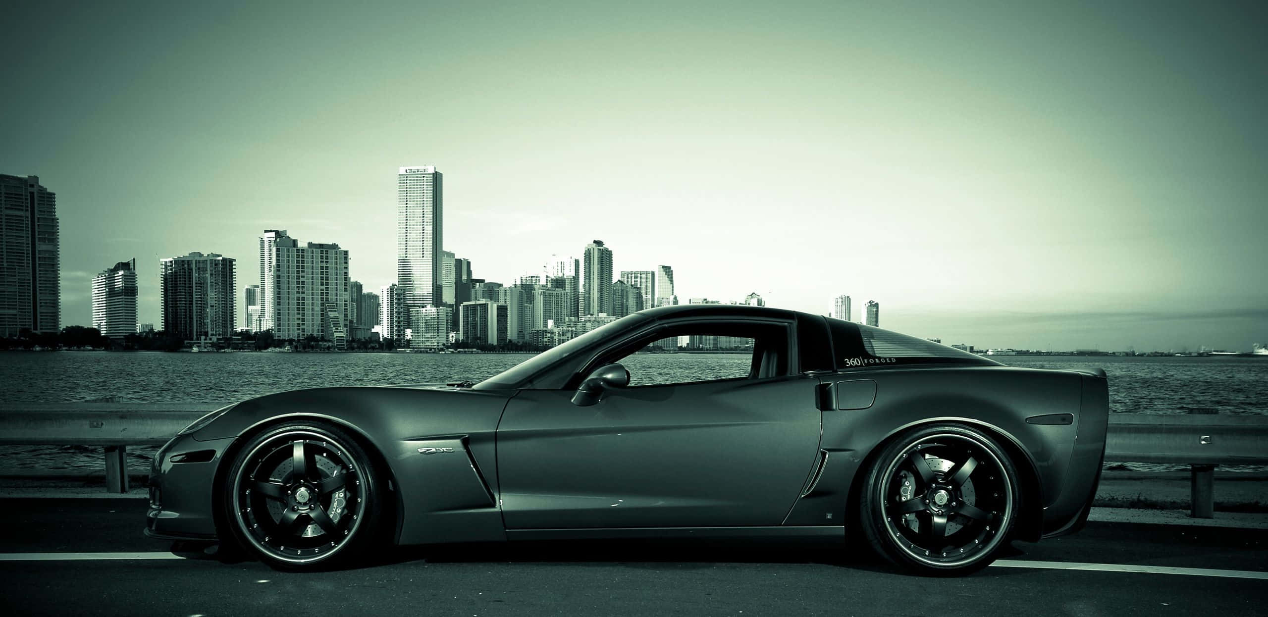 Chevrolet Corvette Z06, matte gray, waterfront road, 2K Desktop Wallpaper