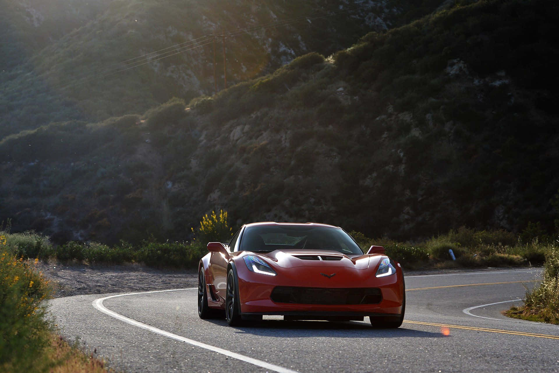 Chevrolet Corvette Z06, vibrant red, winding mountain road, Full HD Desktop Wallpaper