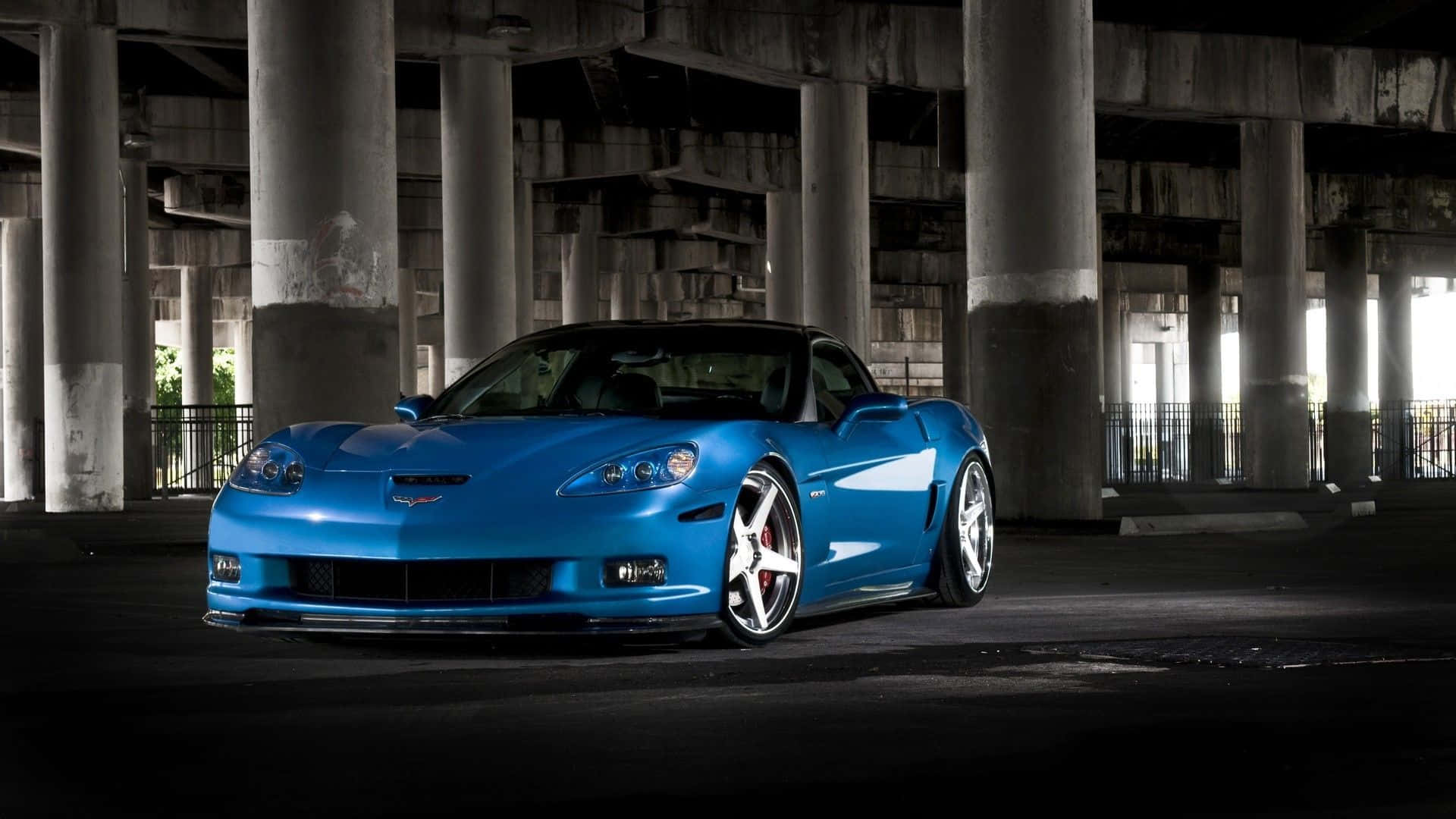 Chevrolet Corvette Z06, vibrant blue, dramatic lighting, Full HD Desktop Wallpaper