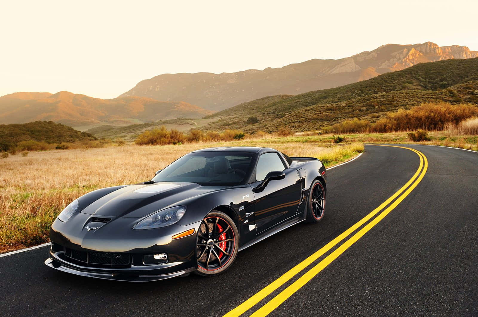 Chevrolet Corvette ZR1, sleek black sports car, red brake calipers, HD Desktop Wallpaper