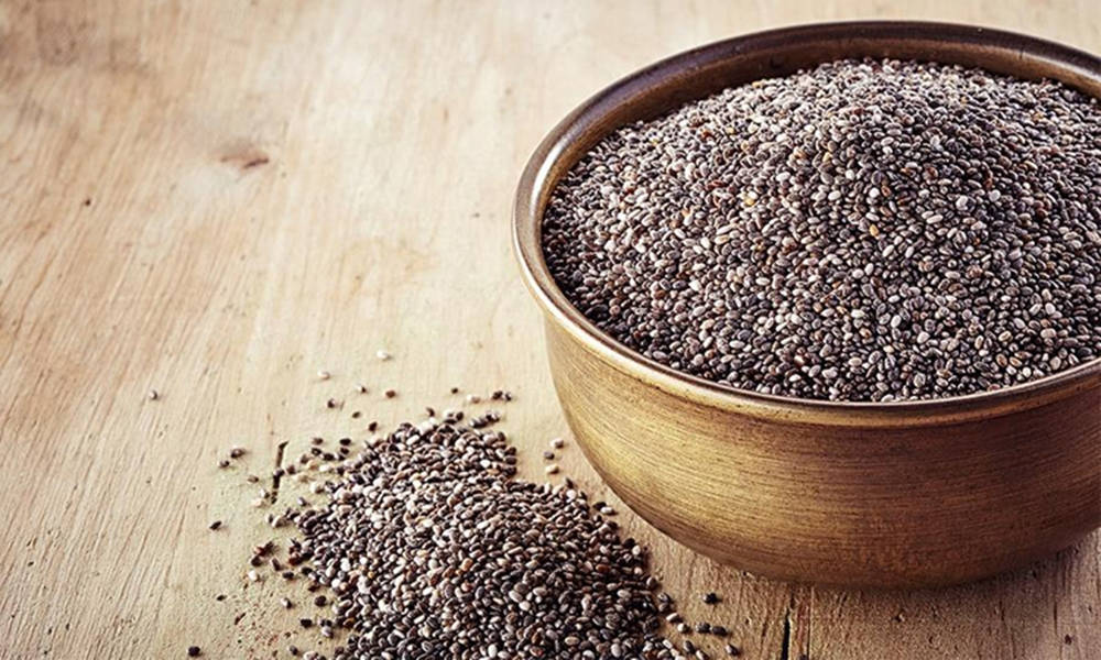 chia seeds, rustic wooden bowl, warm wooden surface, SD Desktop Wallpaper