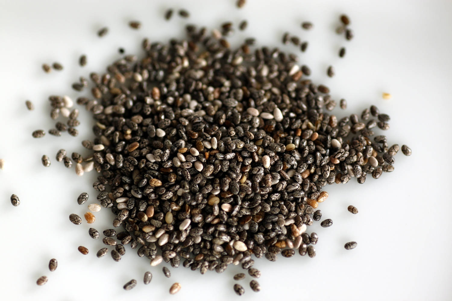 chia seeds, white surface, dark chia seeds, HD Desktop Wallpaper