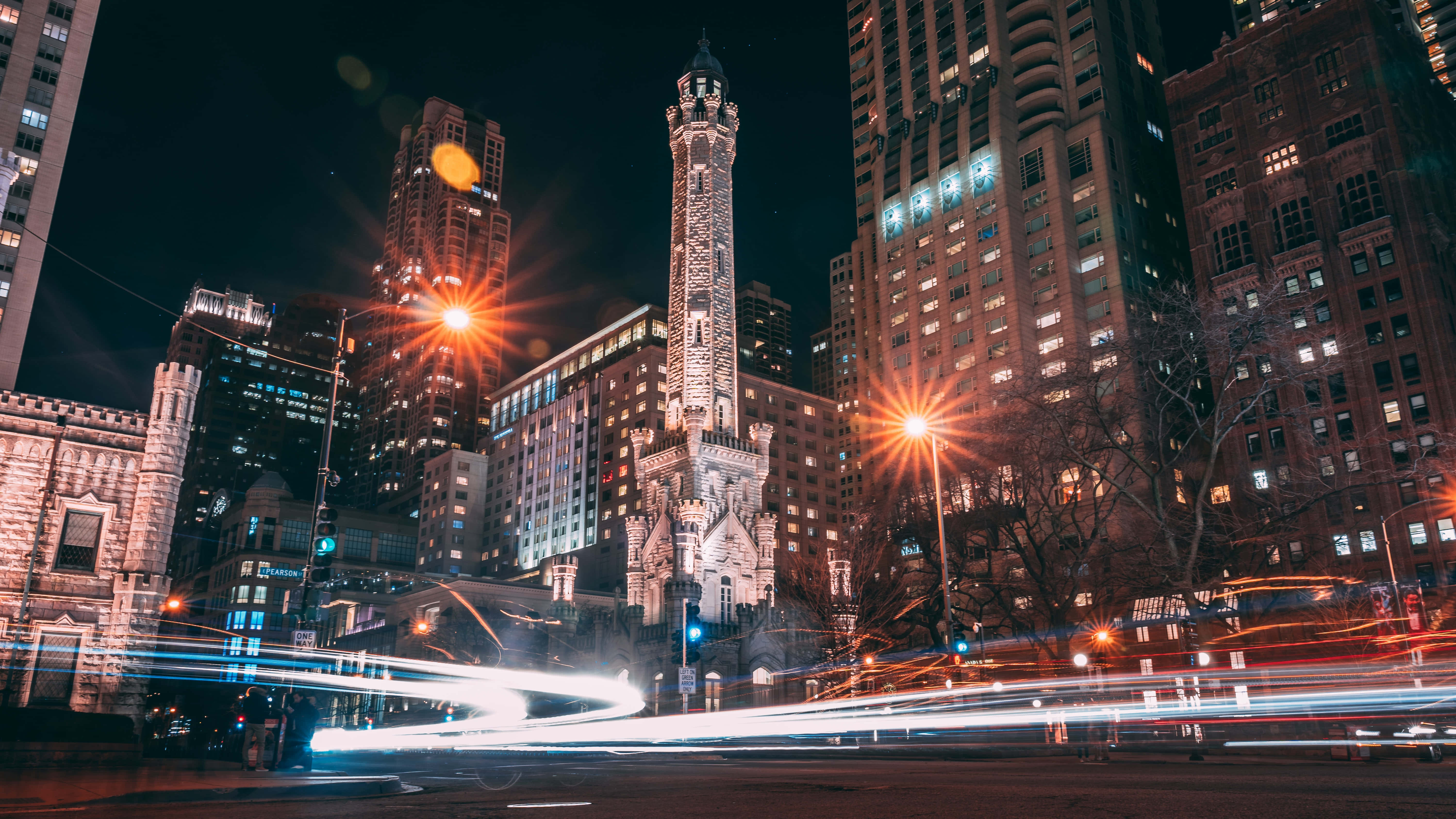 Chicago City Night, historic stone tower, glowing skyscrapers, 5K Desktop Wallpaper