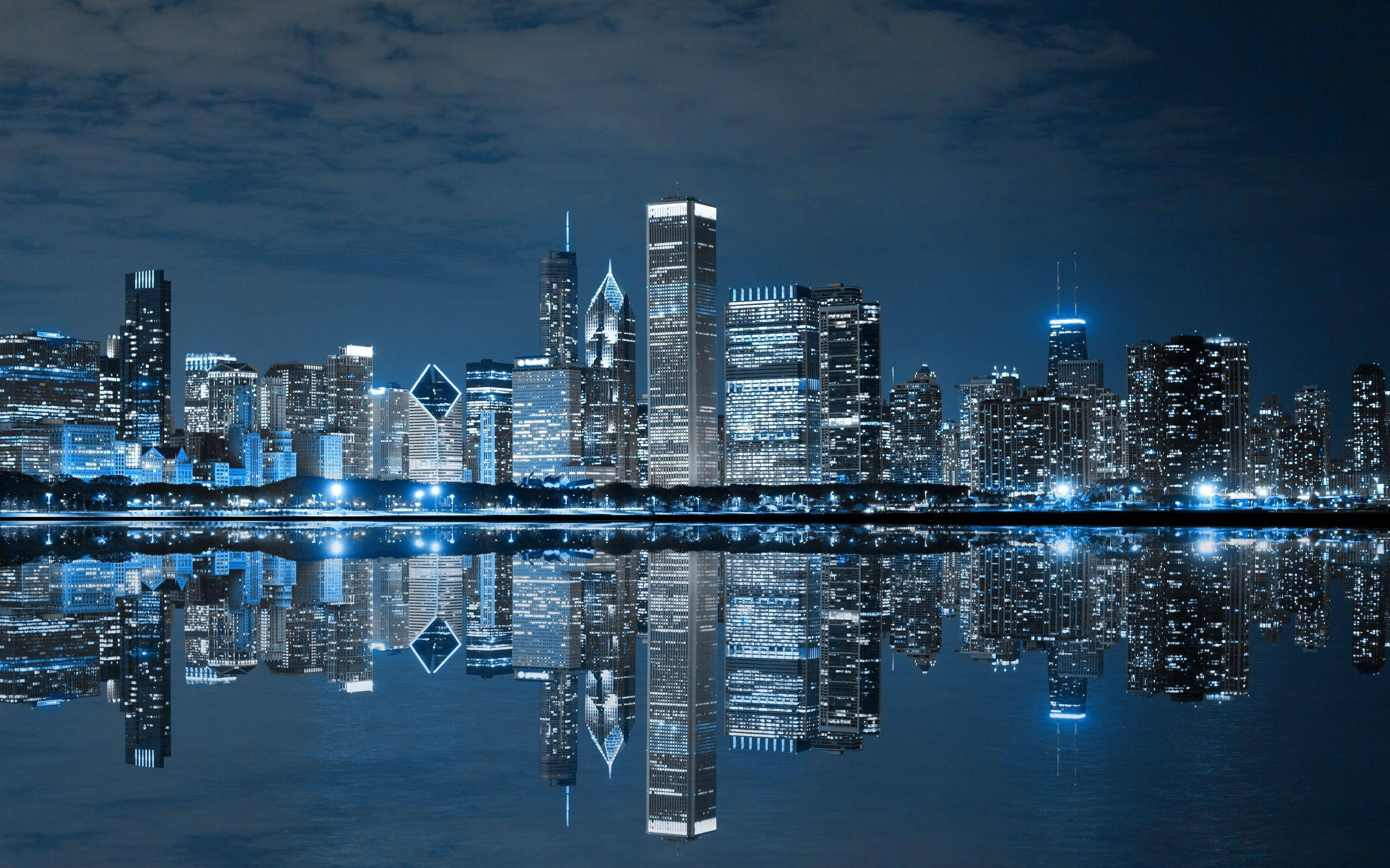 Chicago Skyline, blue lights, nighttime cityscape, 2K Desktop Wallpaper