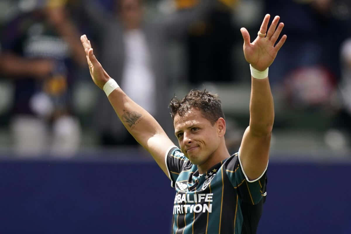 Chicharito, dark green jersey, stadium lights, SD Desktop Wallpaper
