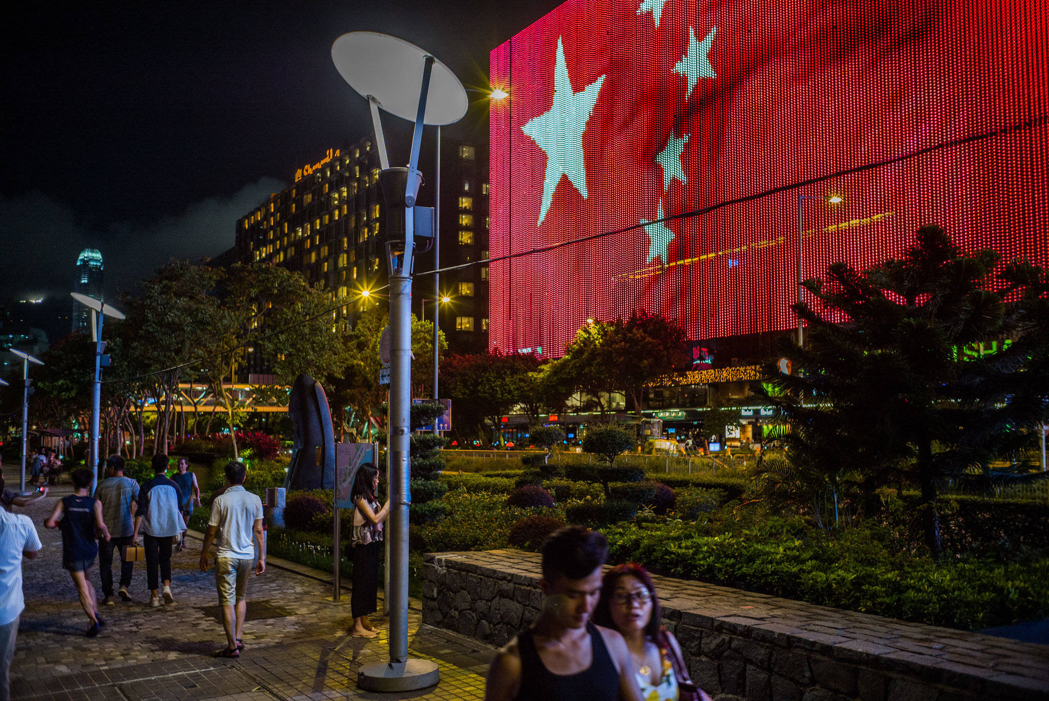 China flag, nighttime city scene, illuminated red flag display, Full HD Desktop Wallpaper
