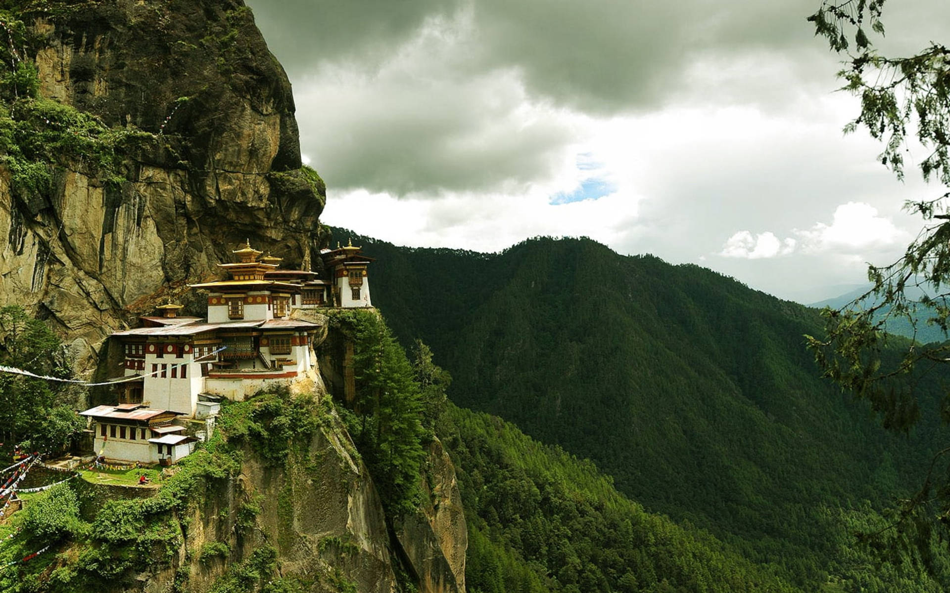 Buddhist monastery, sheer cliffside, lush green valley, Full HD Desktop Wallpaper