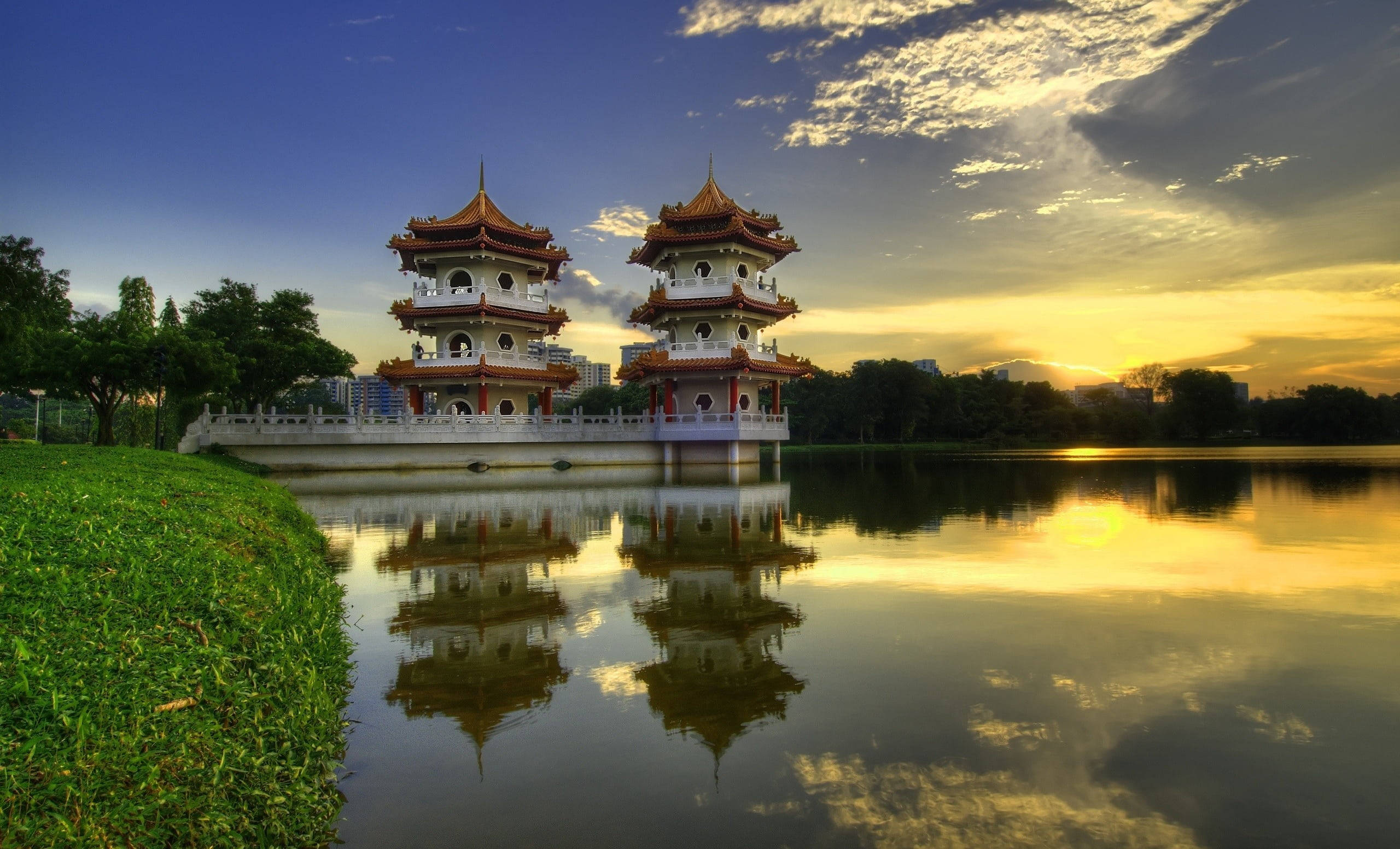 traditional pagodas, calm waters, golden sunset, 2K Desktop Wallpaper