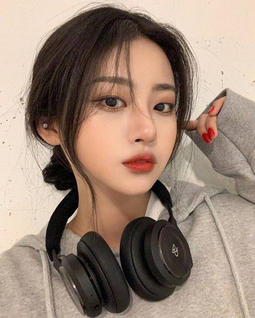 Chinese Girl, black over-ear headphones, dark hair, SD Phone Wallpaper