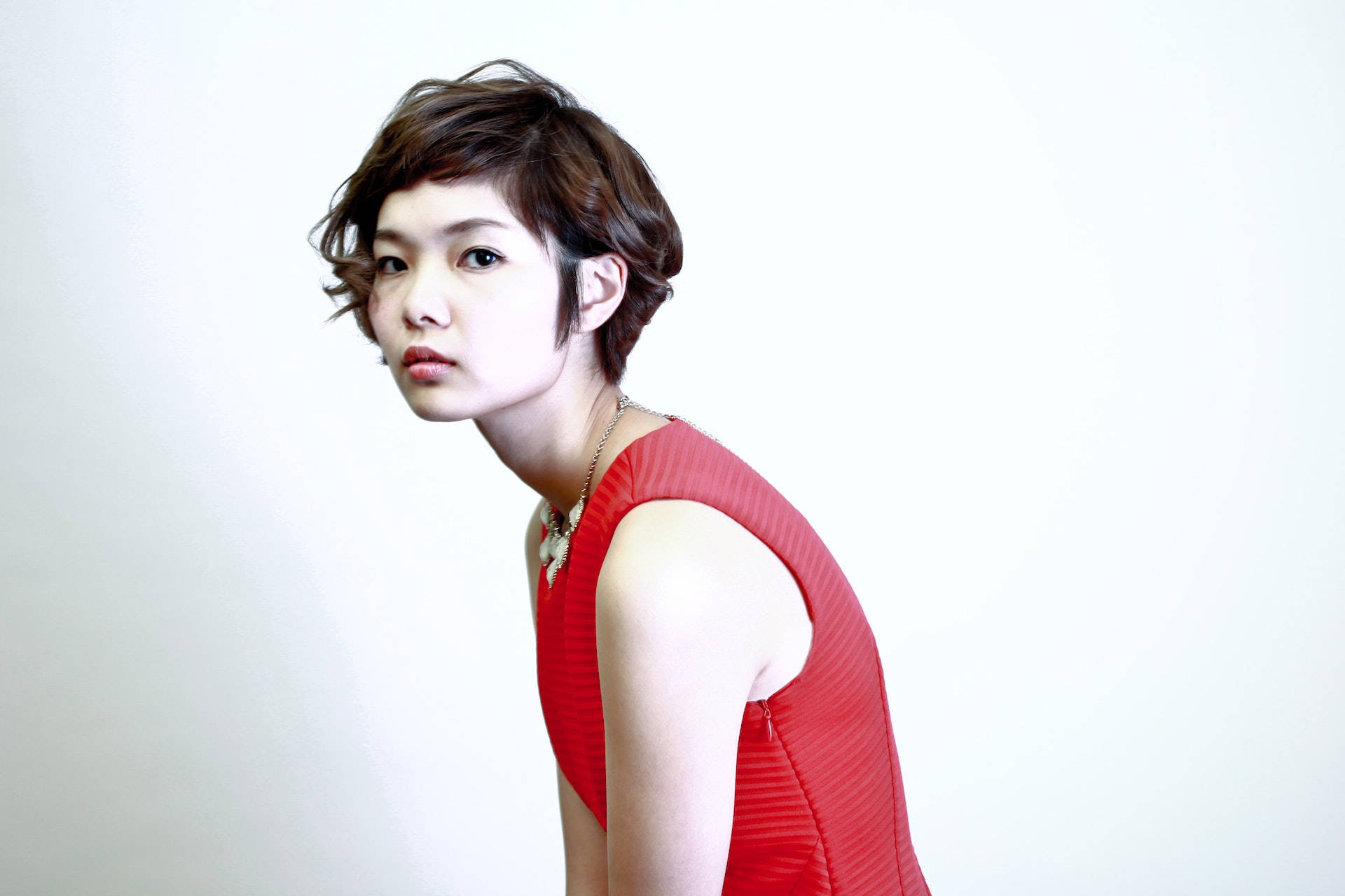 Asian Woman, red sleeveless dress, short brown hair, Full HD Desktop Wallpaper