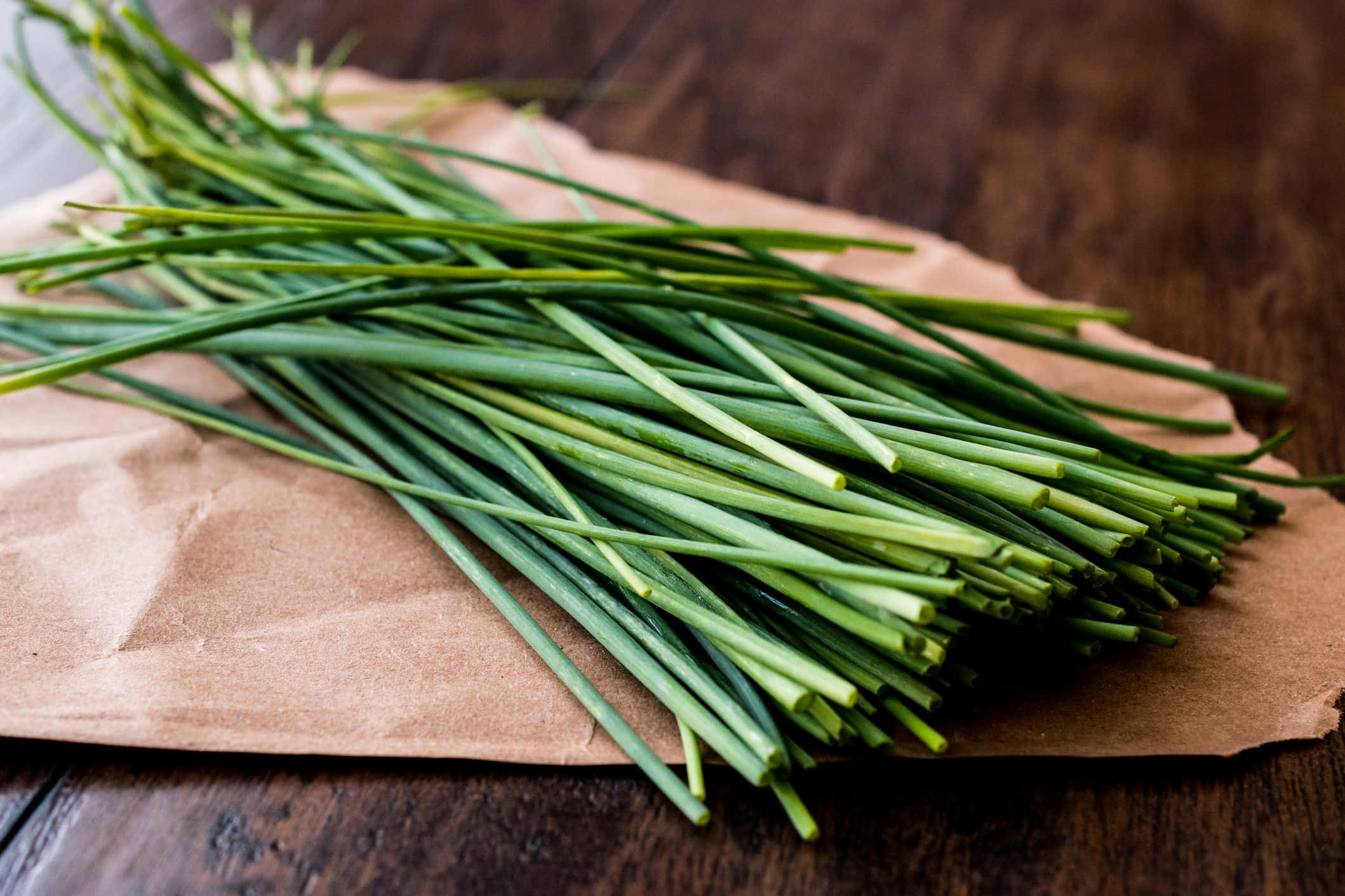 fresh green chives, brown paper, crinkled brown paper, Full HD Desktop Wallpaper