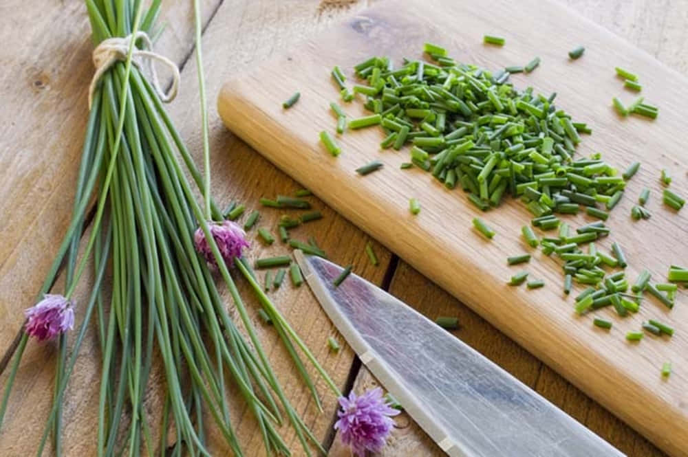 green chives, purple blossoms, wooden cutting board, SD Desktop Wallpaper