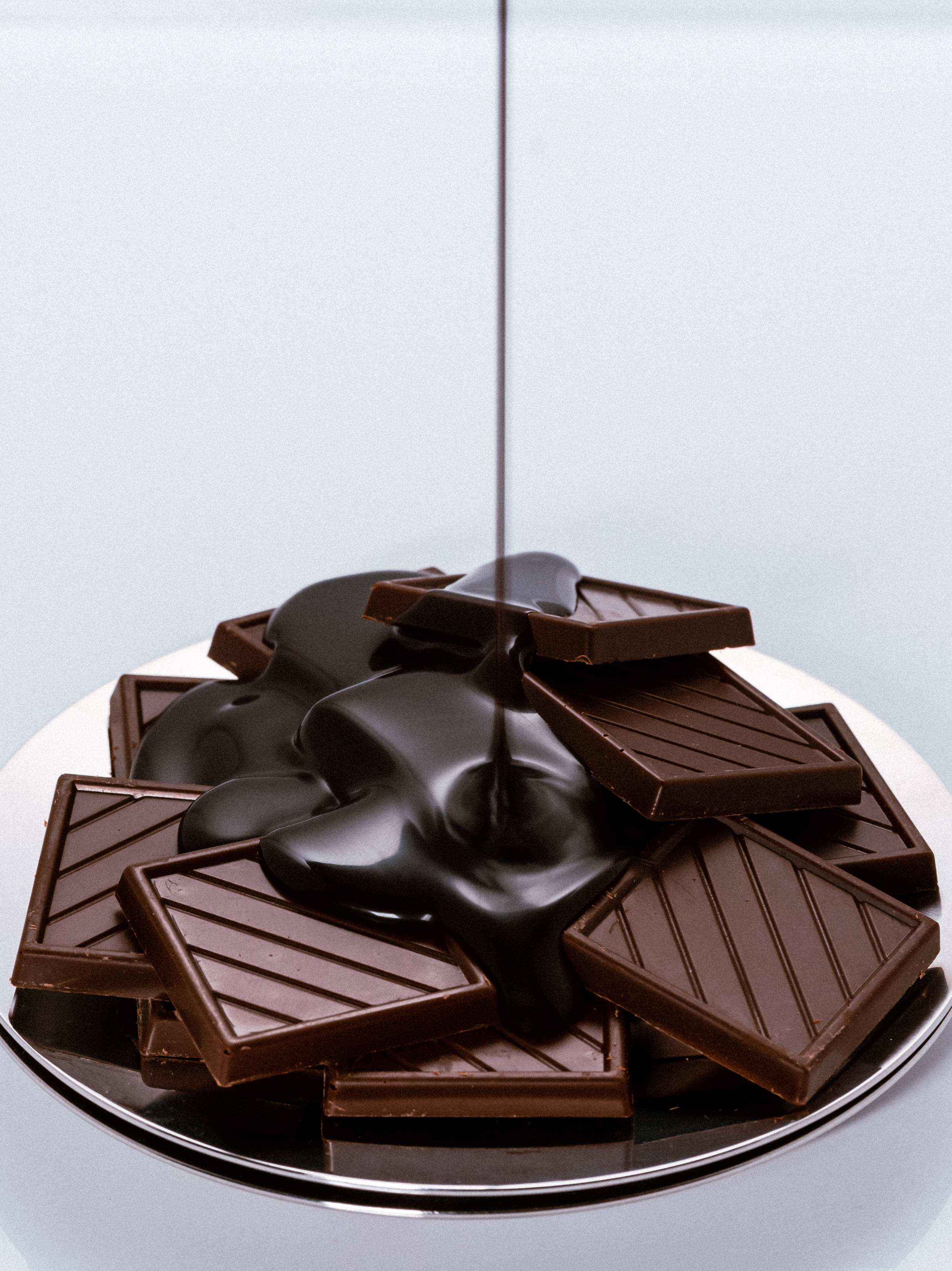 dark chocolate syrup, broken chocolate bars, silver plate, 2K Phone Wallpaper