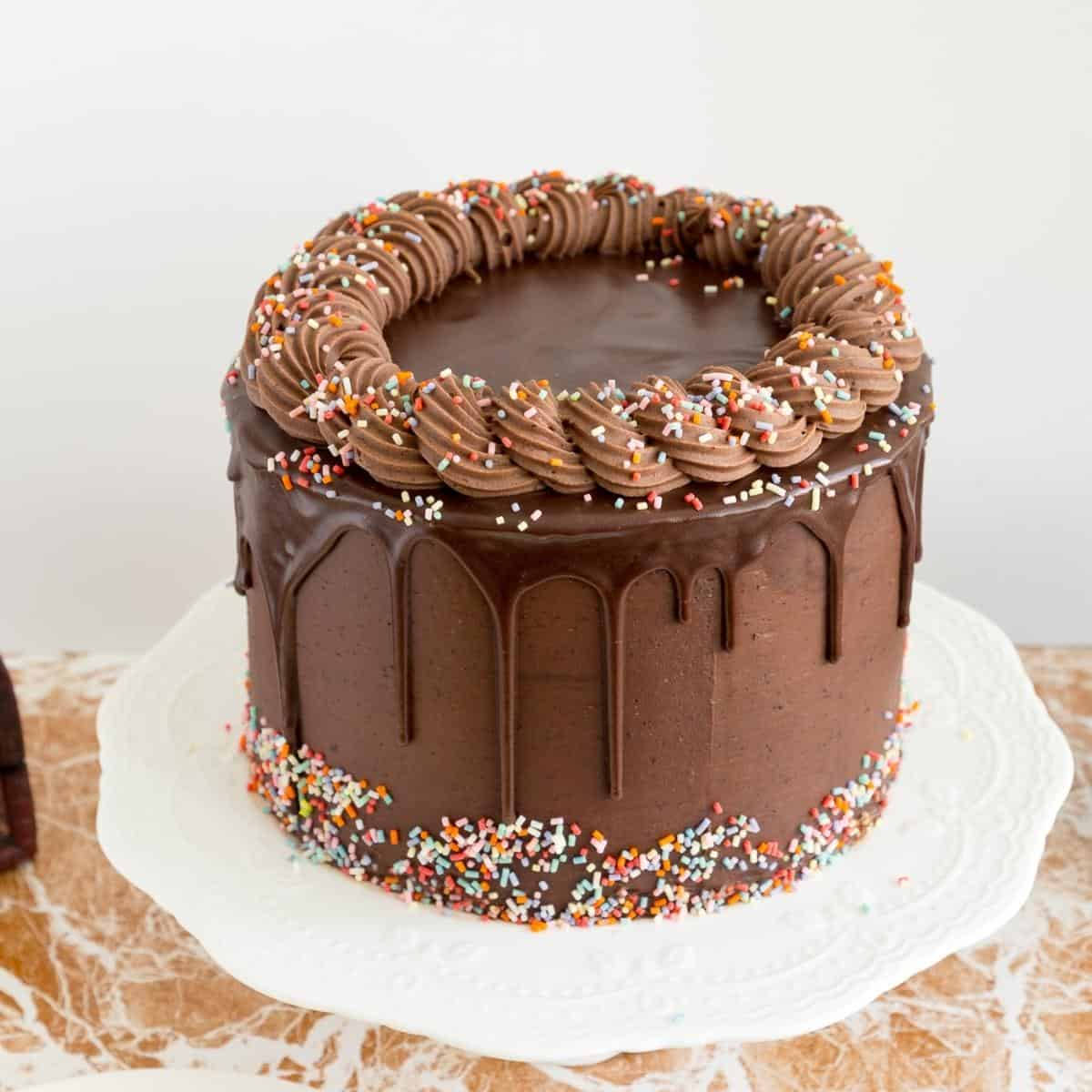 chocolate cake, glossy drip frosting, colorful sprinkles, SD Desktop Wallpaper