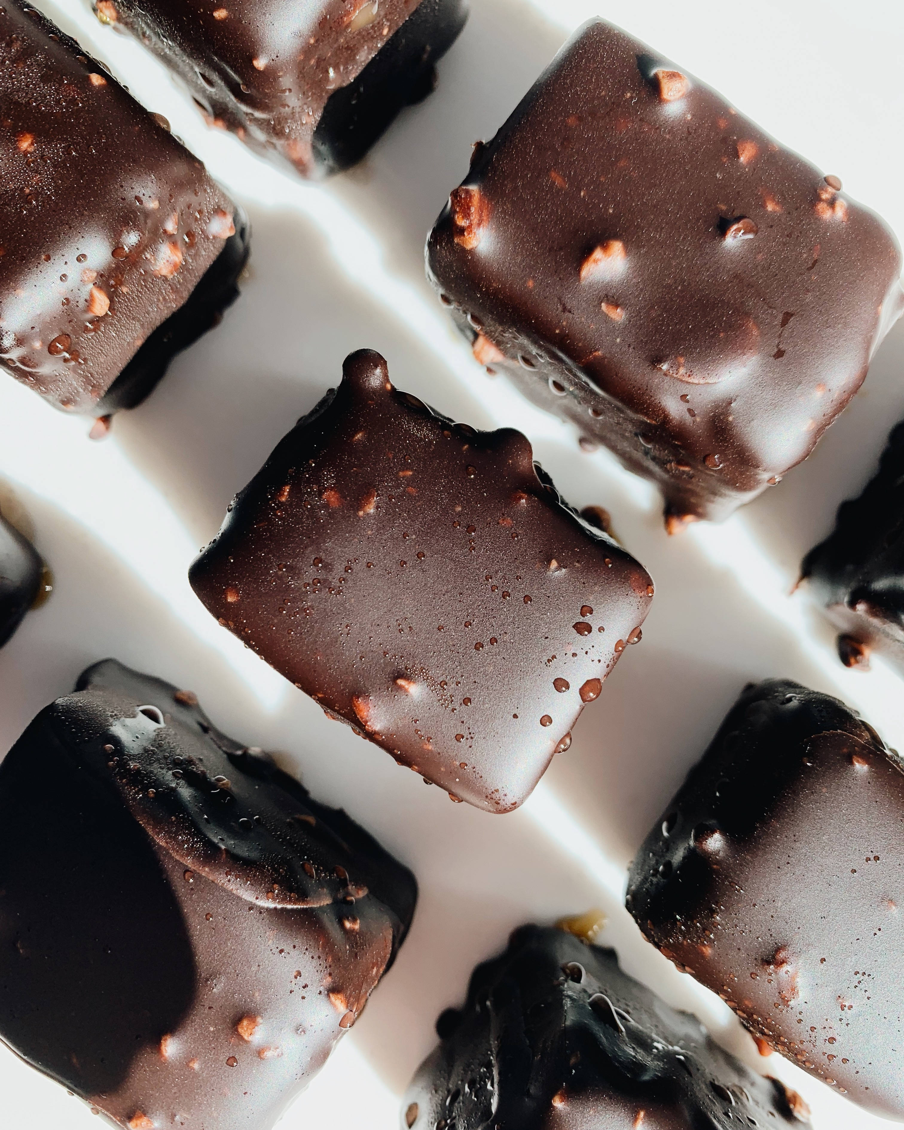 Chocolate, glossy chocolate squares, crushed nut sprinkles, 2K Phone Wallpaper