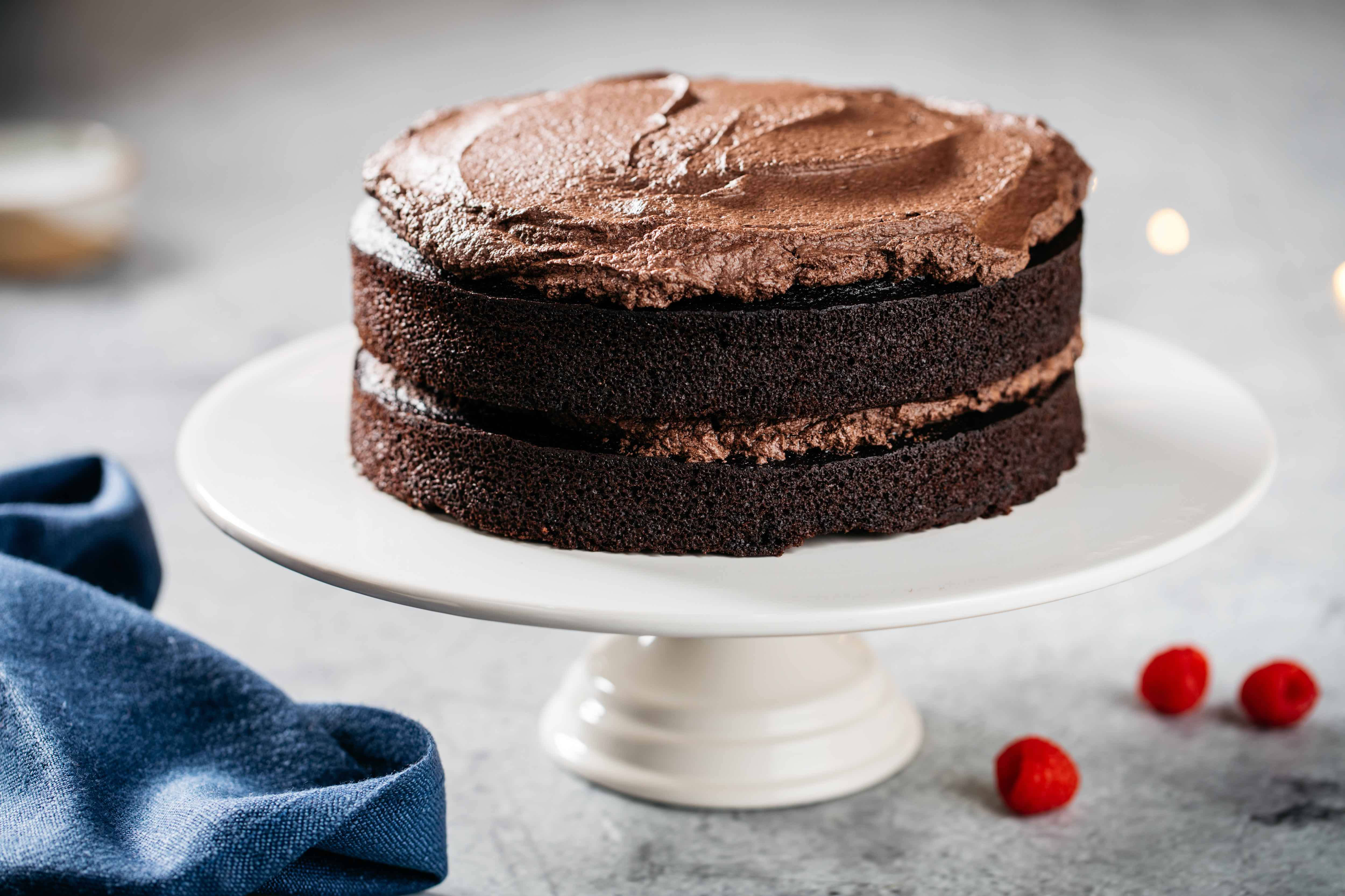 luxurious chocolate cake, glossy frosting, white cake stand, 4K Desktop Wallpaper