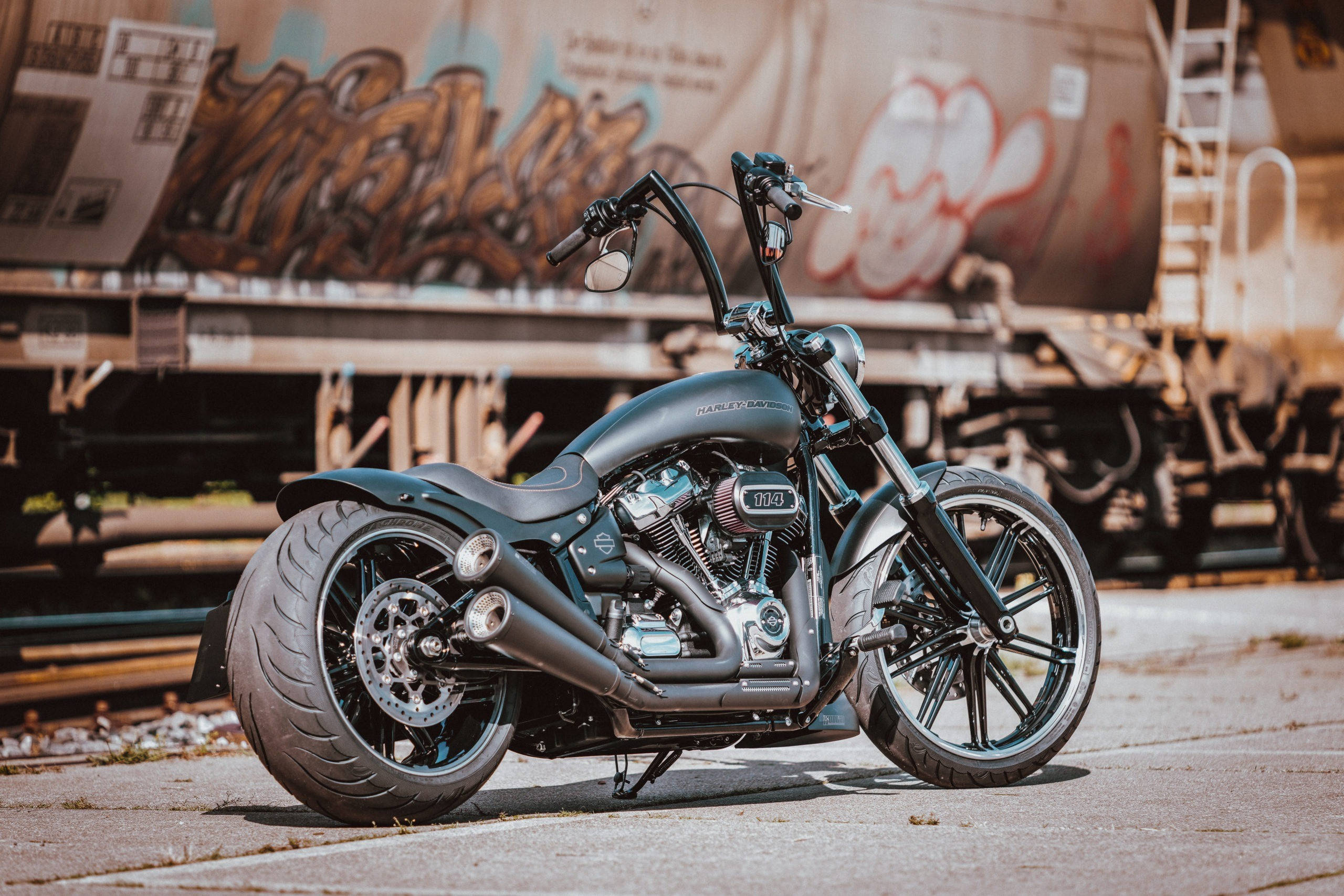 matte black, custom chopper motorcycle, concrete, 2K Desktop Wallpaper