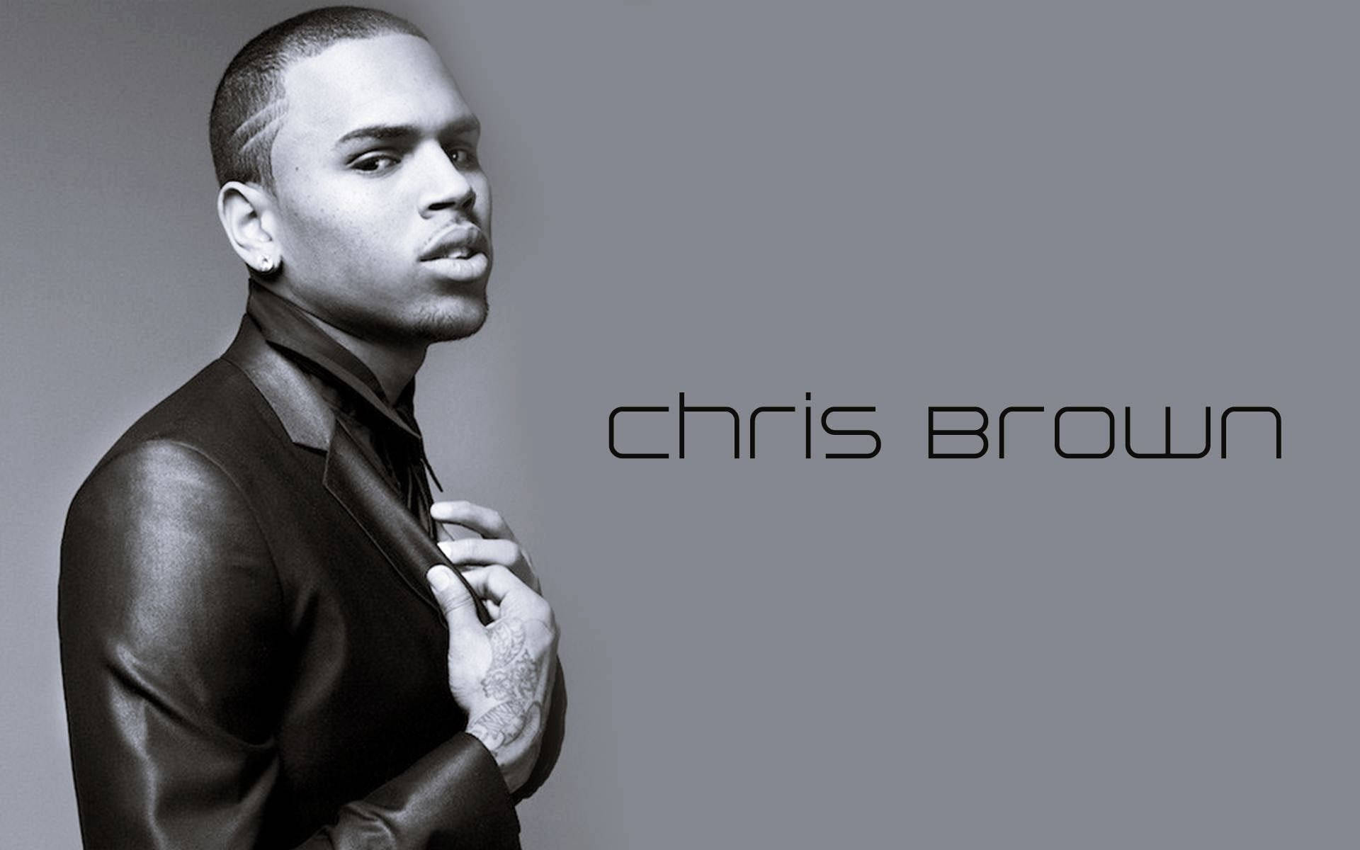 Chris Brown, sleek black leather jacket, minimalist gray background, Full HD Desktop Wallpaper