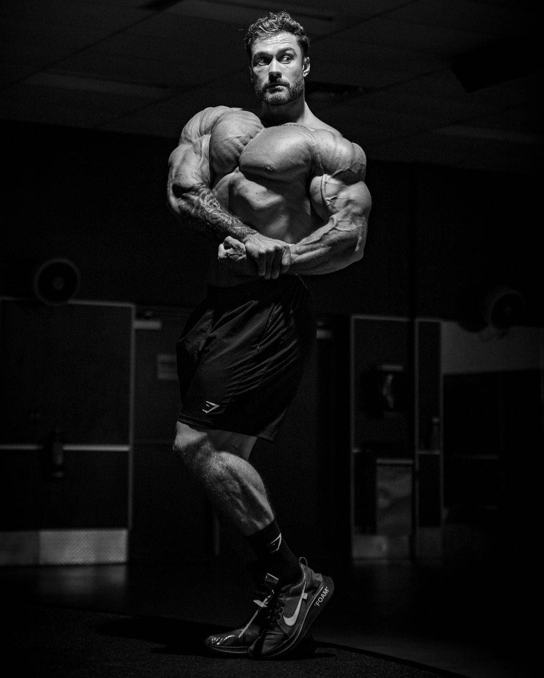 Chris Bumstead, side chest pose, gym, HD Phone Wallpaper