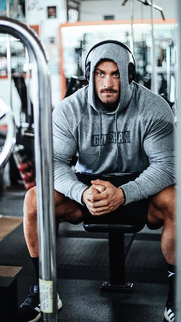 Chris Bumstead, gray hoodie, gym bench, HD Phone Wallpaper