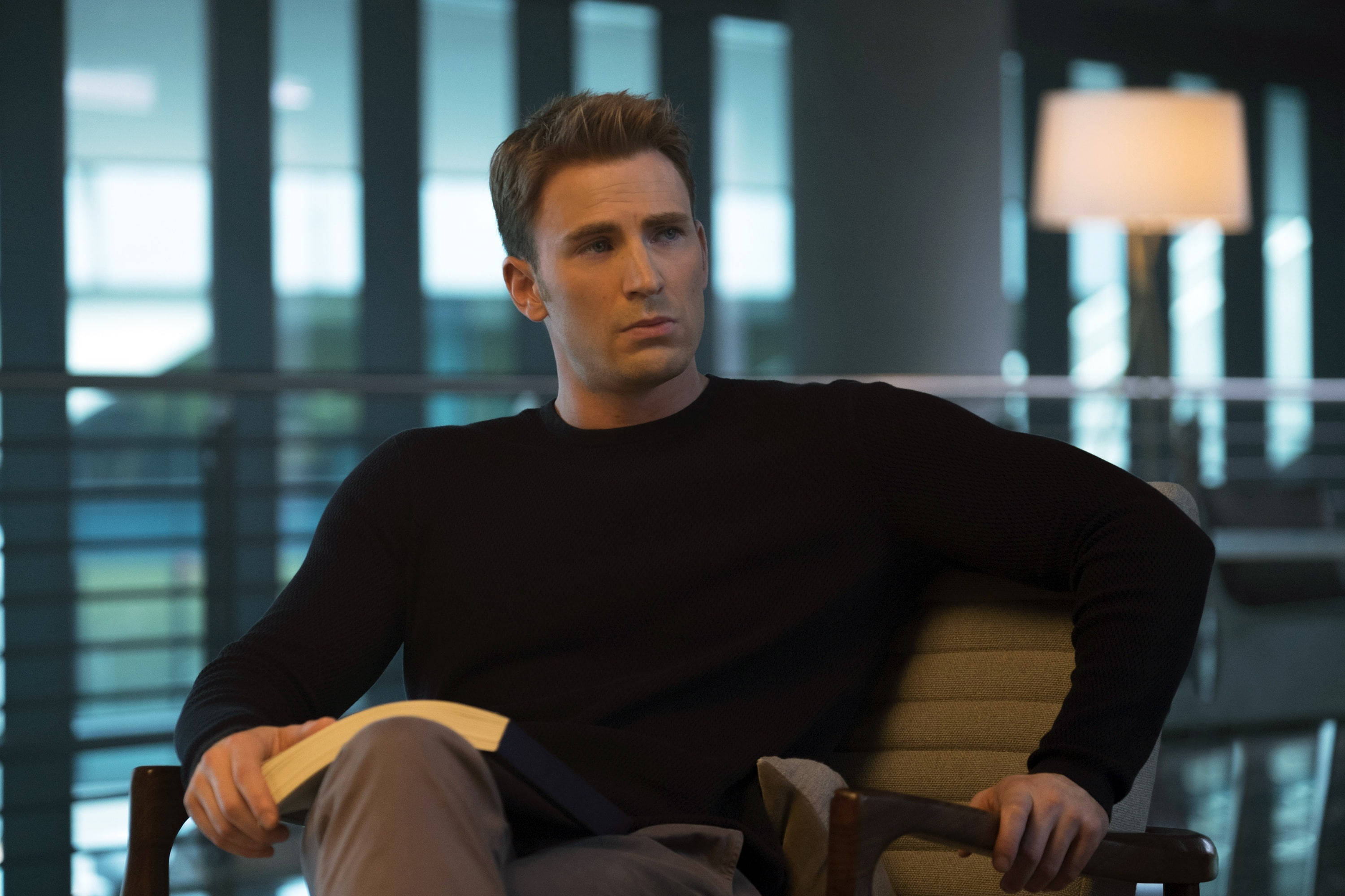 Chris Evans, black sweater, book, 2K Desktop Wallpaper