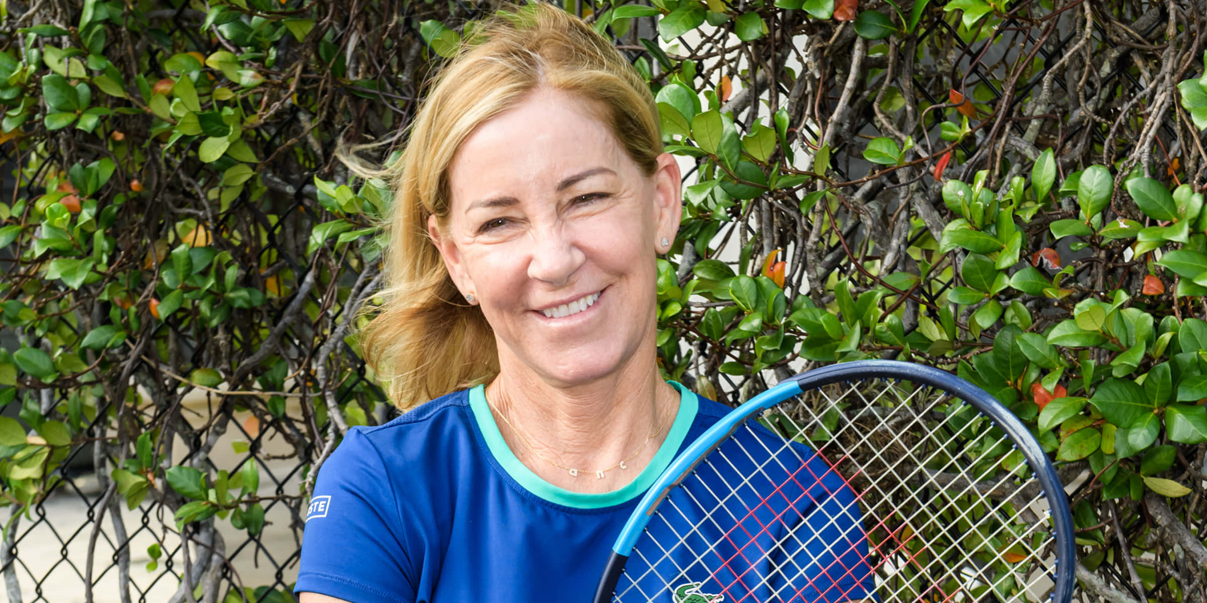 Chris Evert, blue tennis shirt, green foliage, Full HD Desktop Wallpaper