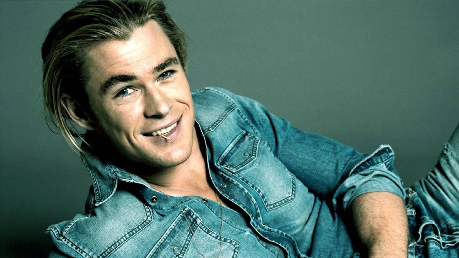 Chris Hemsworth, denim shirt, muted green studio backdrop, Full HD Desktop Wallpaper