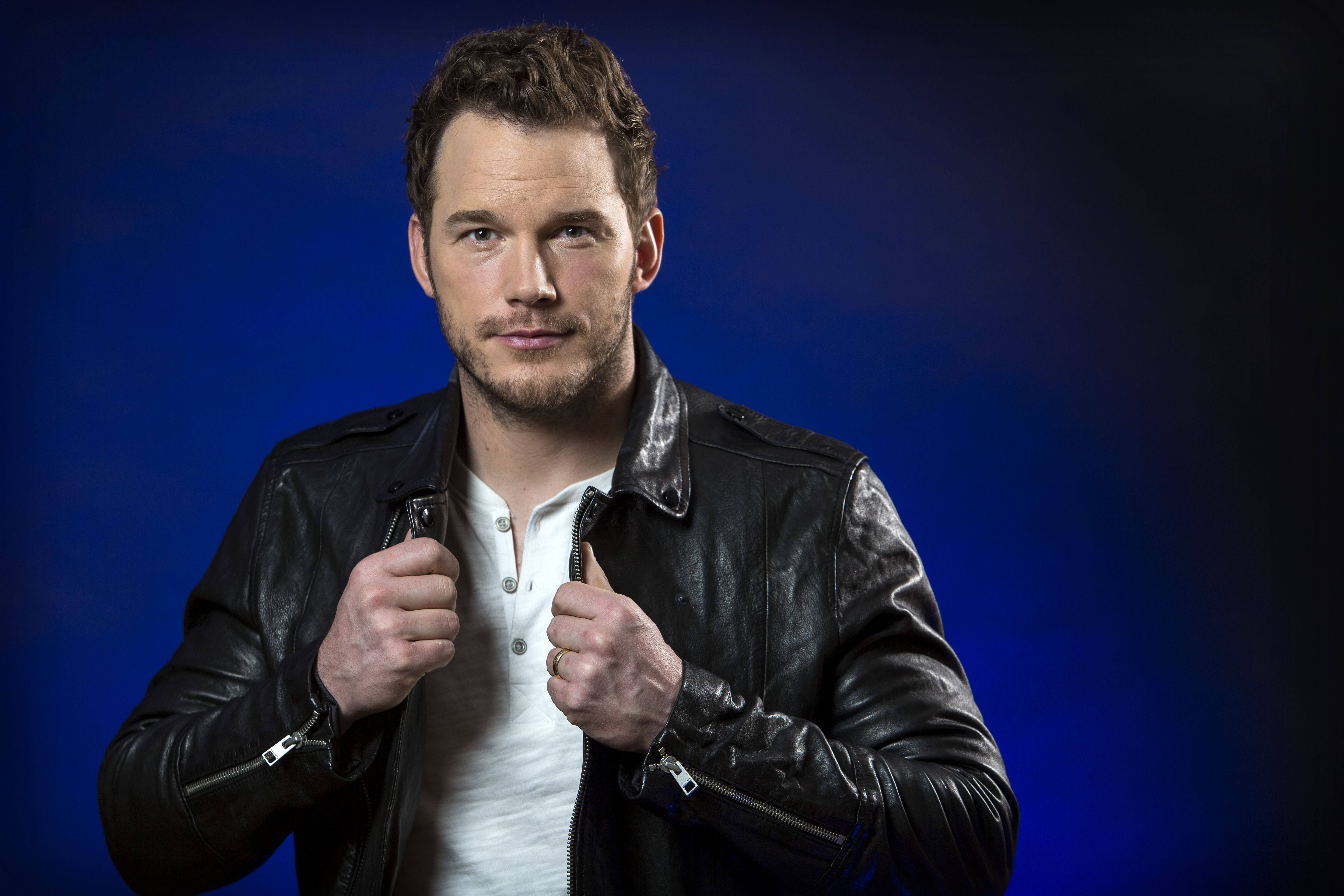 Chris Pratt, black leather jacket, deep blue studio backdrop, 5K Desktop Wallpaper