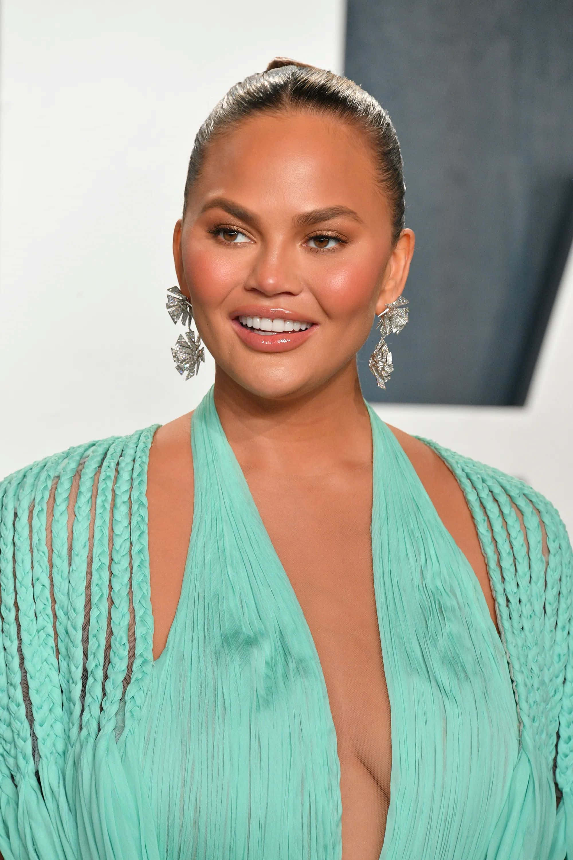 Chrissy Teigen, teal braided gown, statement earrings, 2K Phone Wallpaper