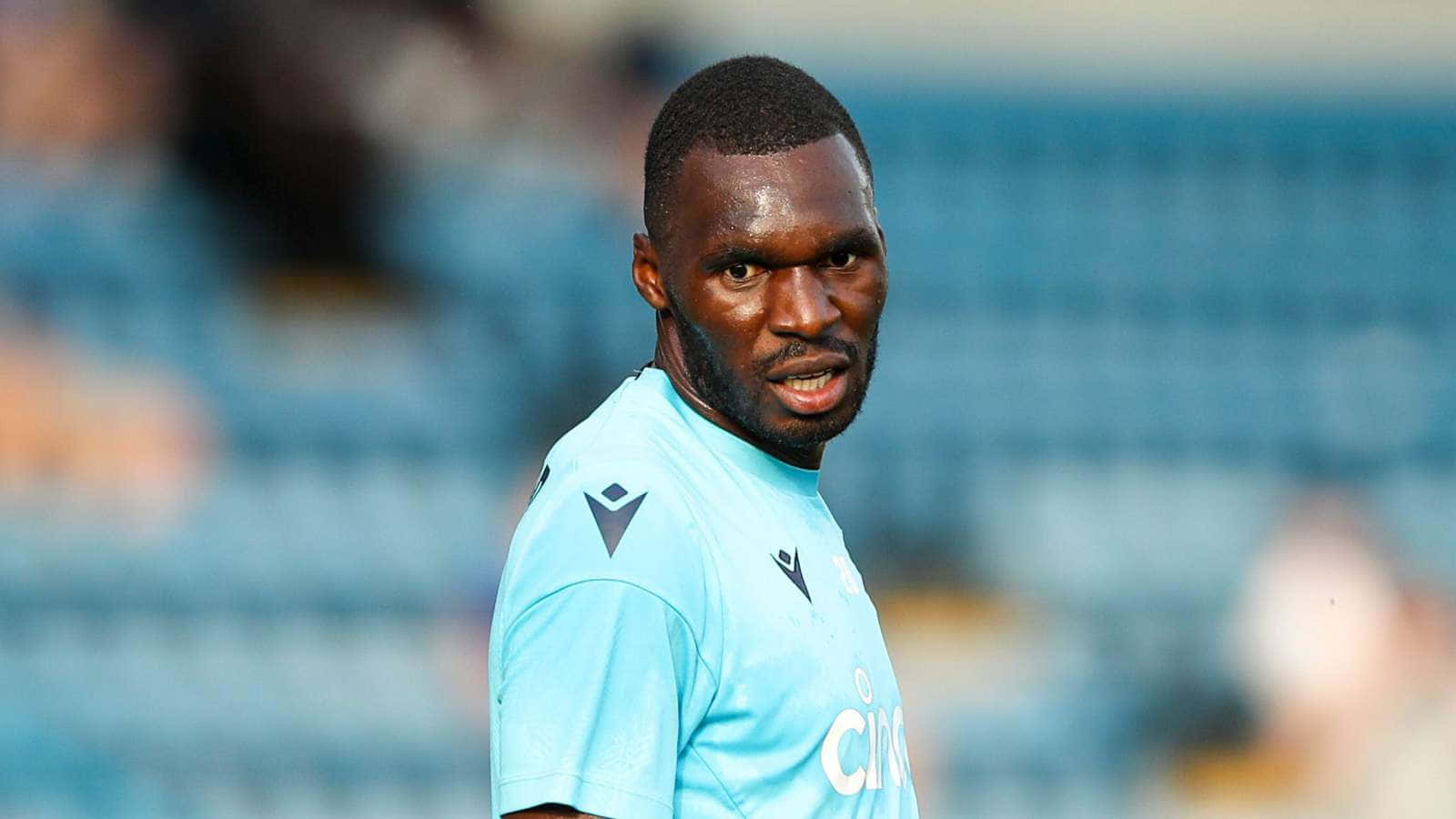 Christian Benteke, light blue jersey, stadium field, HD Desktop Wallpaper