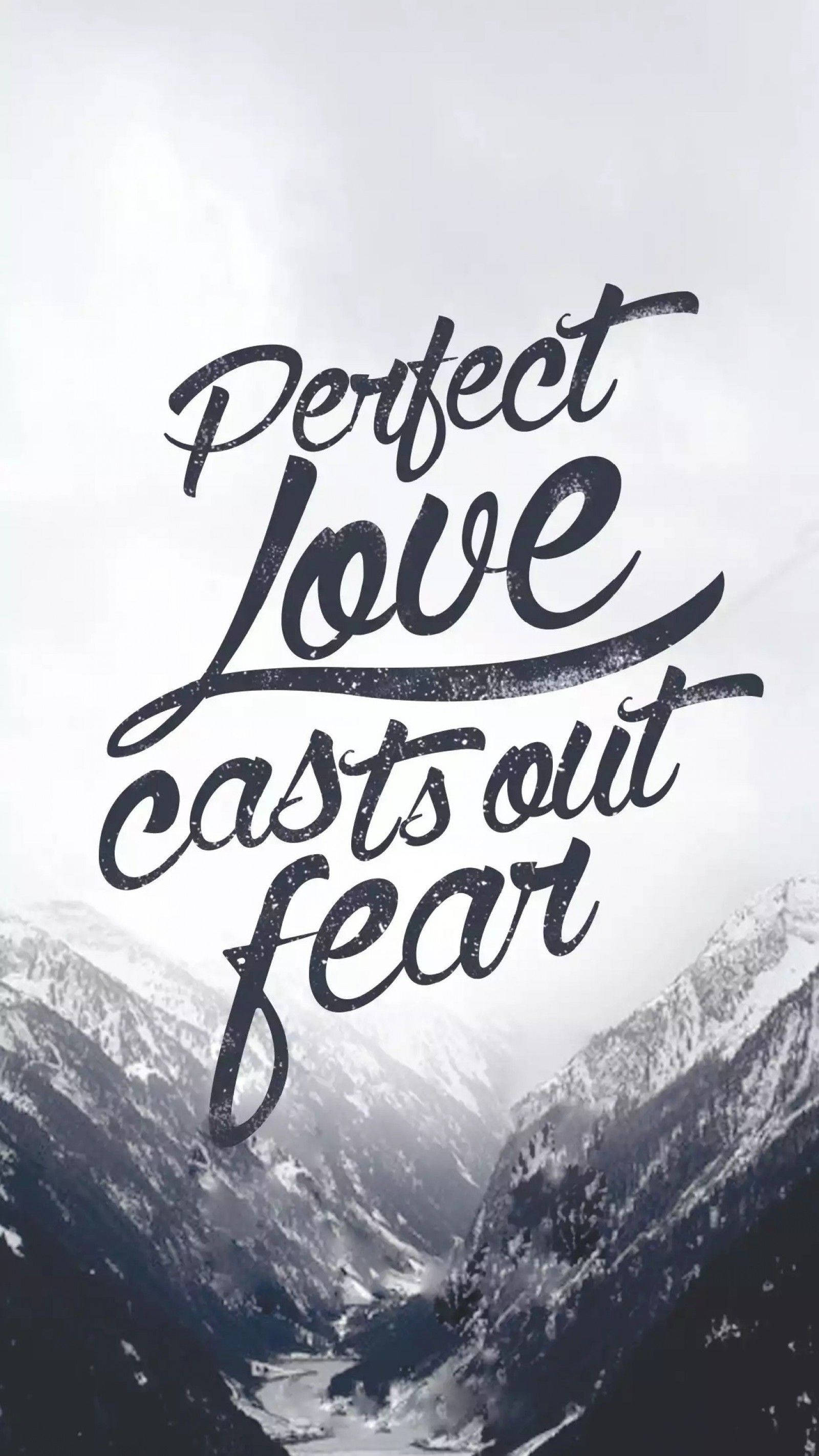 Perfect Love casts out fear, monochrome mountain valley, bold brushstroke lettering, 2K Phone Wallpaper