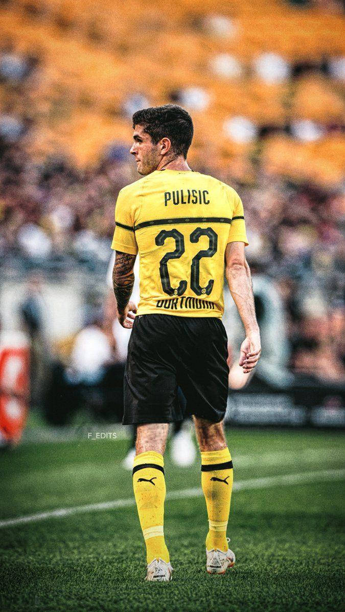 Christian Pulisic, yellow Dortmund jersey, green pitch, SD Phone Wallpaper