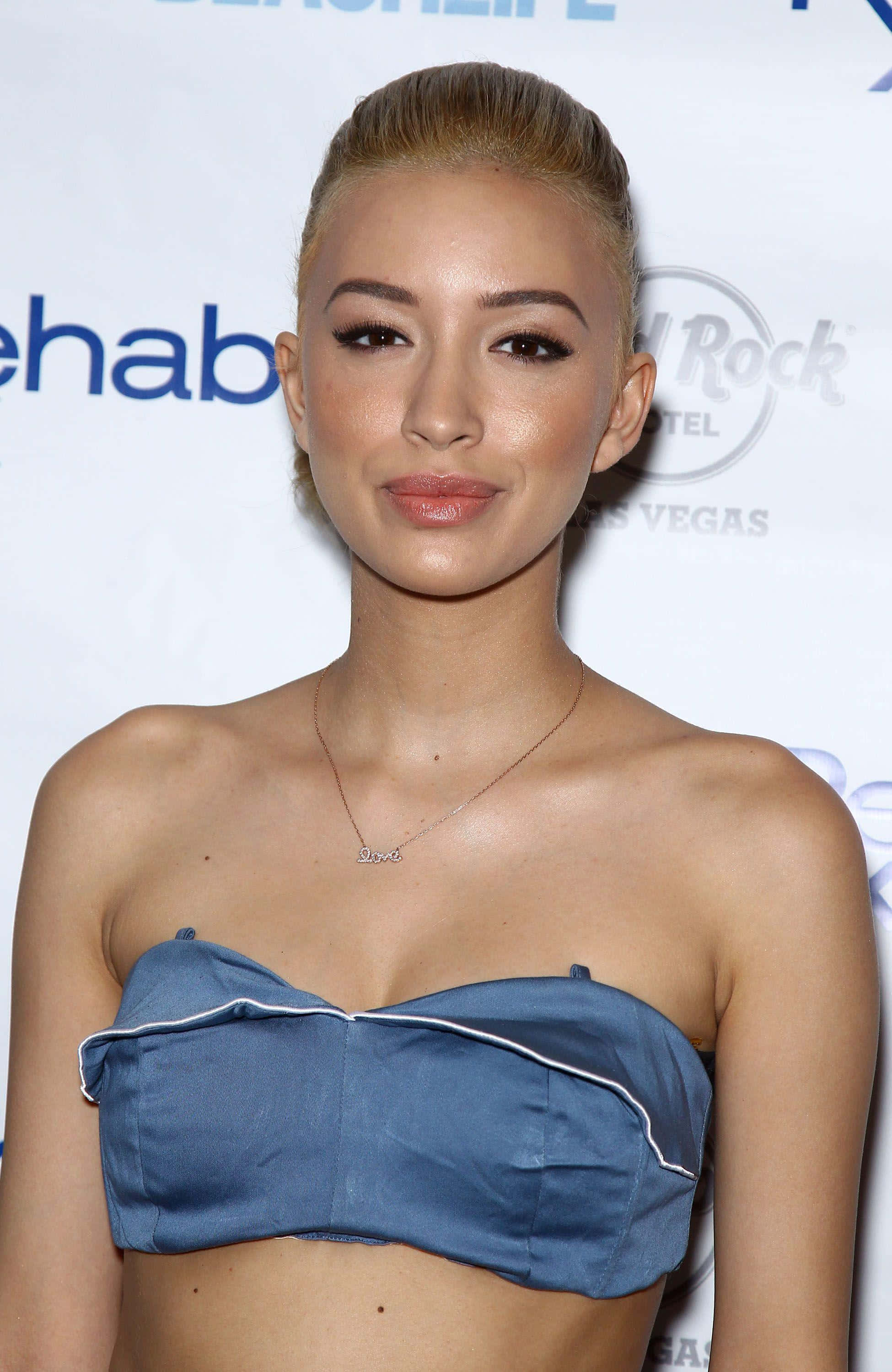 Christian Serratos, blue strapless top, branded event backdrop, 2K Phone Wallpaper