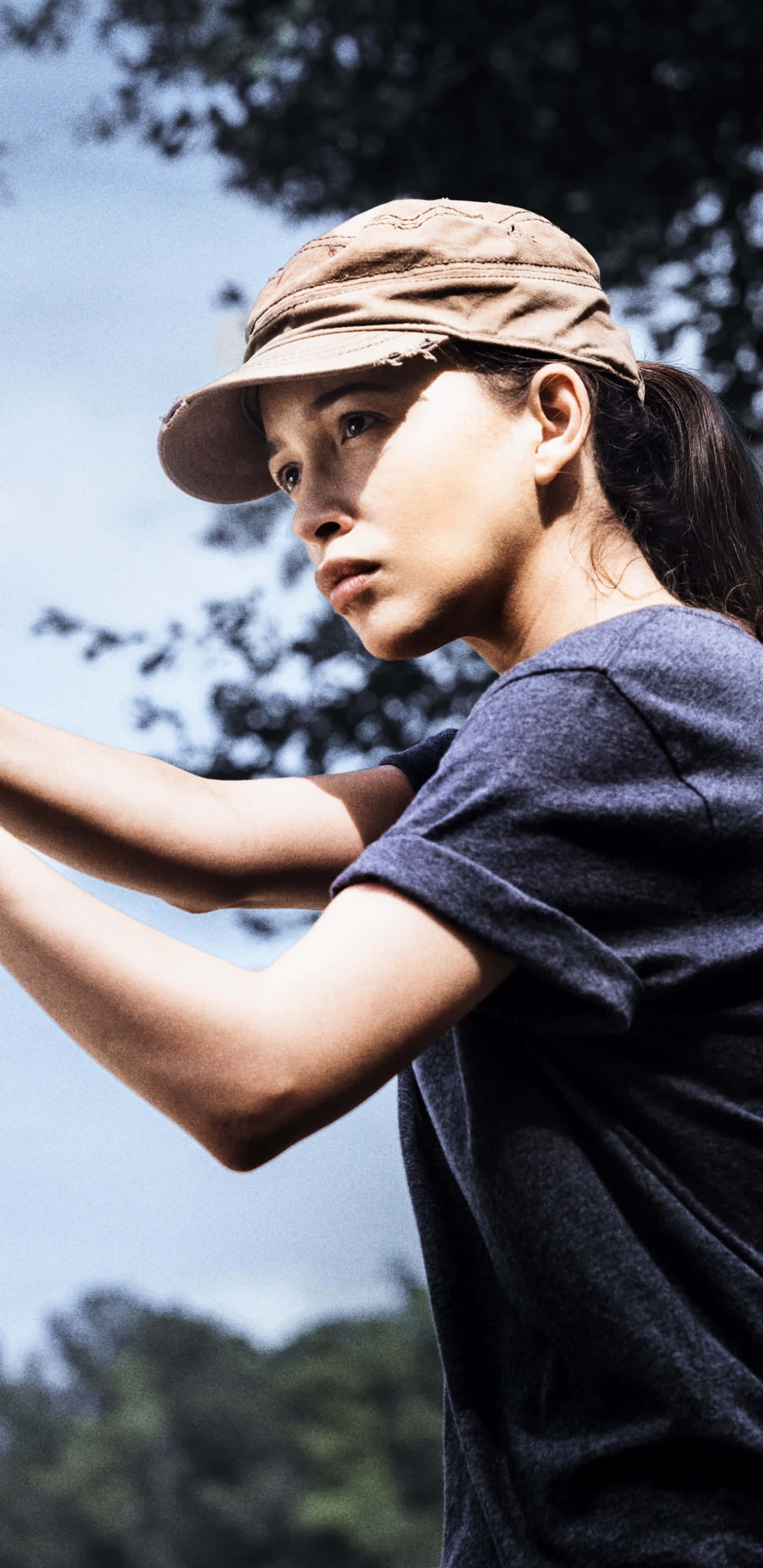 Christian Serratos, beige cap, dark tshirt, 2K Phone Wallpaper