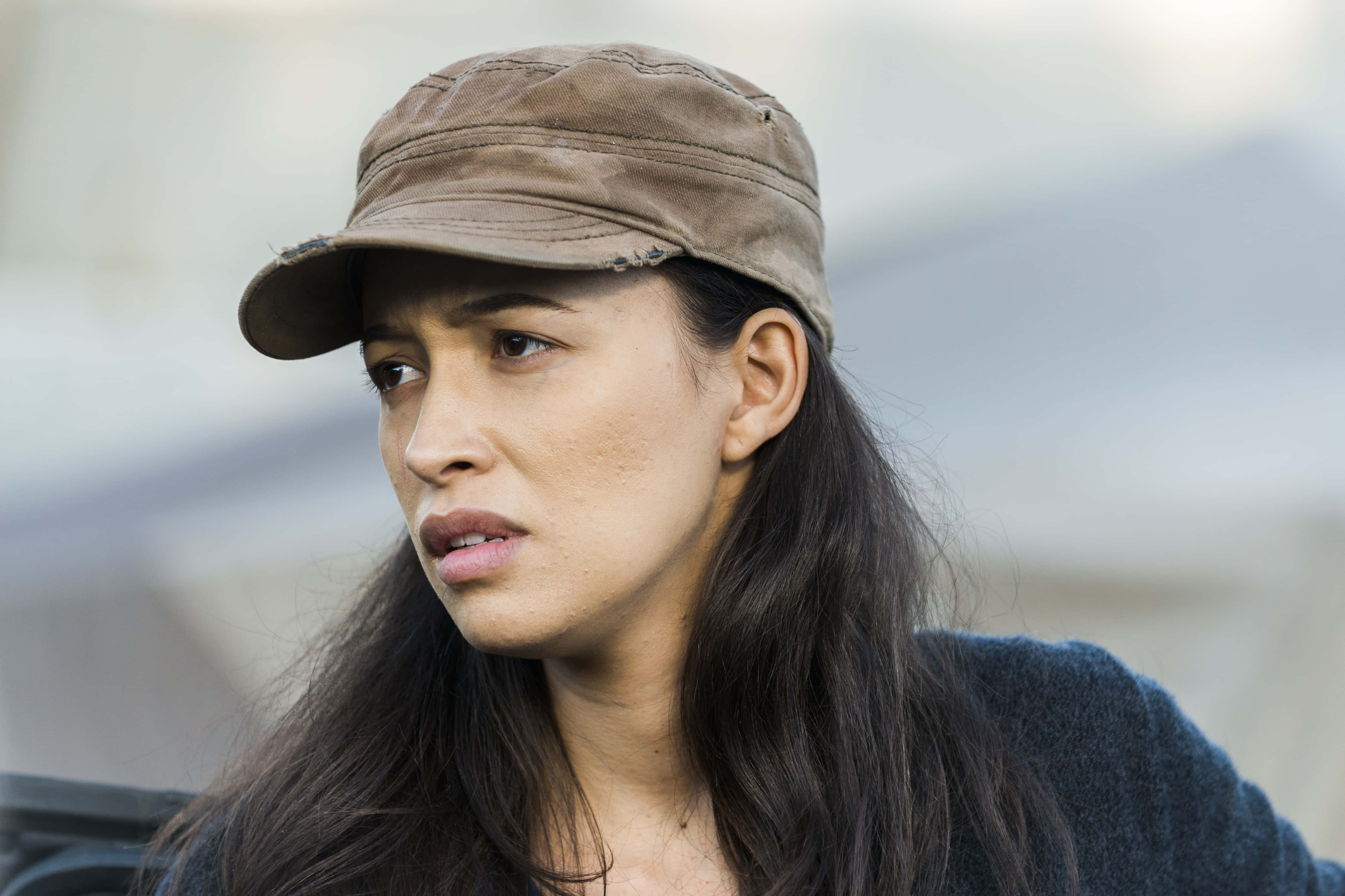 Christian Serratos, long dark hair, worn brown cap, 4K Desktop Wallpaper