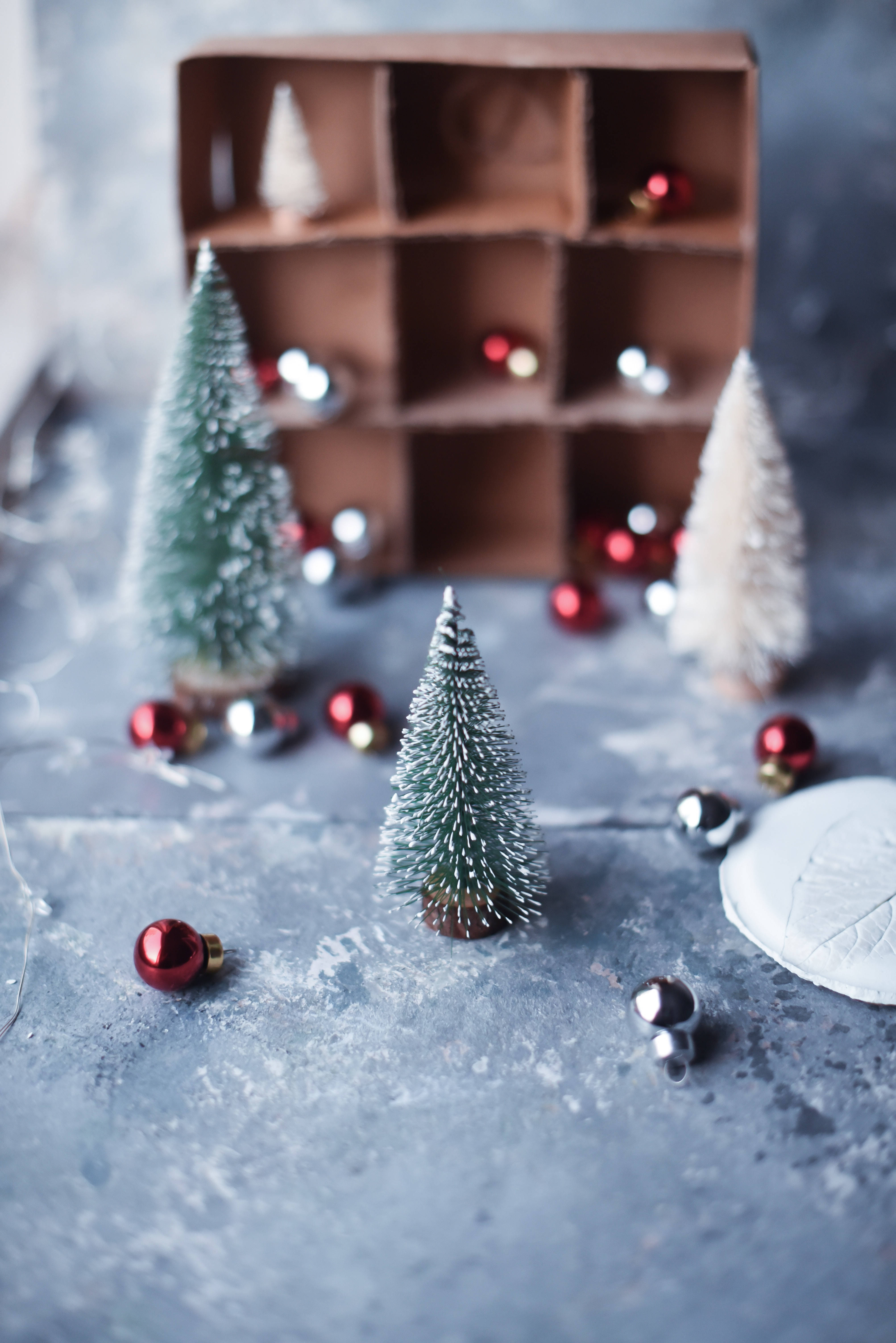 Snowy Miniature Christmas Tree, frosted Christmas trees, shiny red silver ornaments, 5K Phone Wallpaper