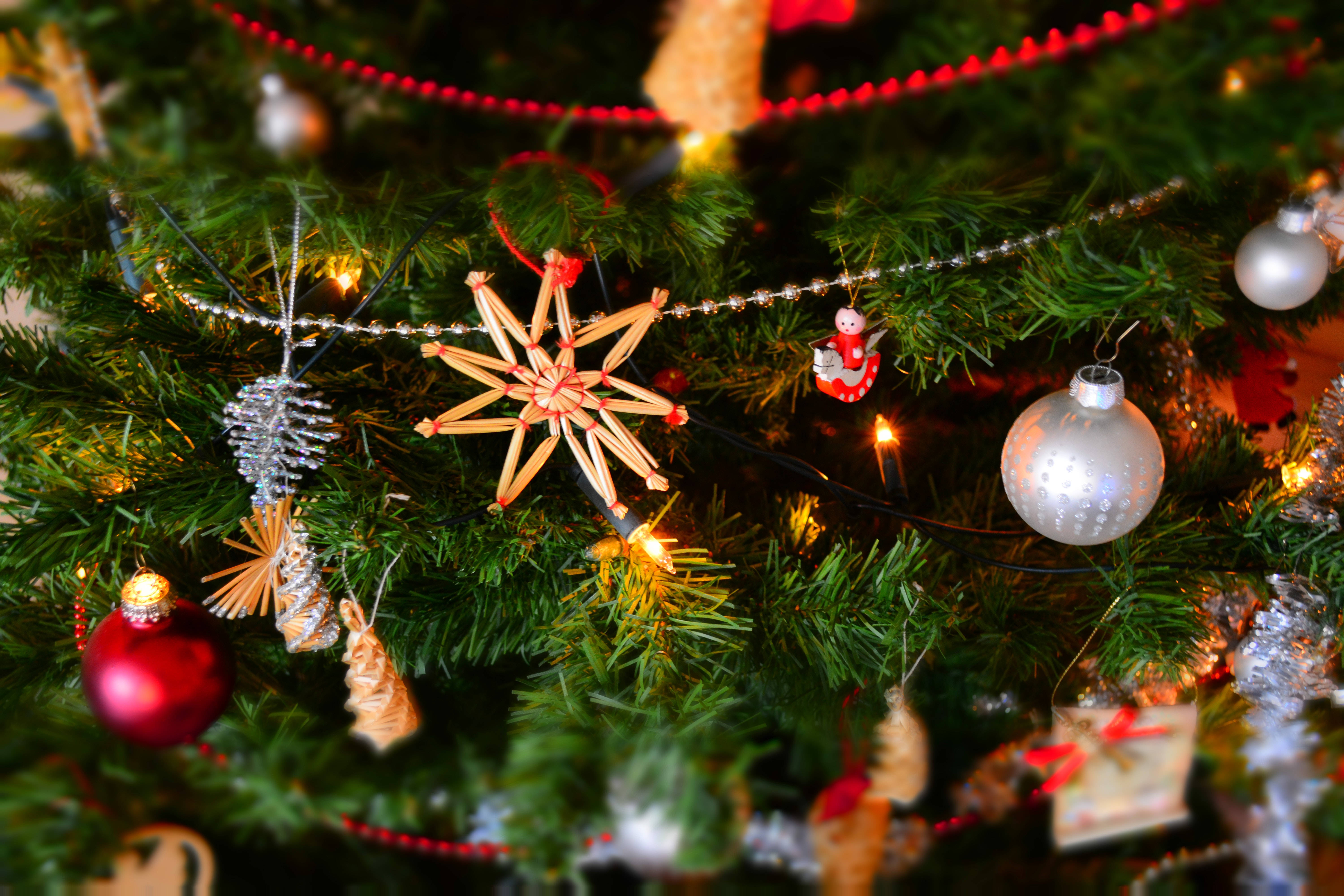 Christmas tree, glowing lights, silver ornaments, 5K Desktop Wallpaper