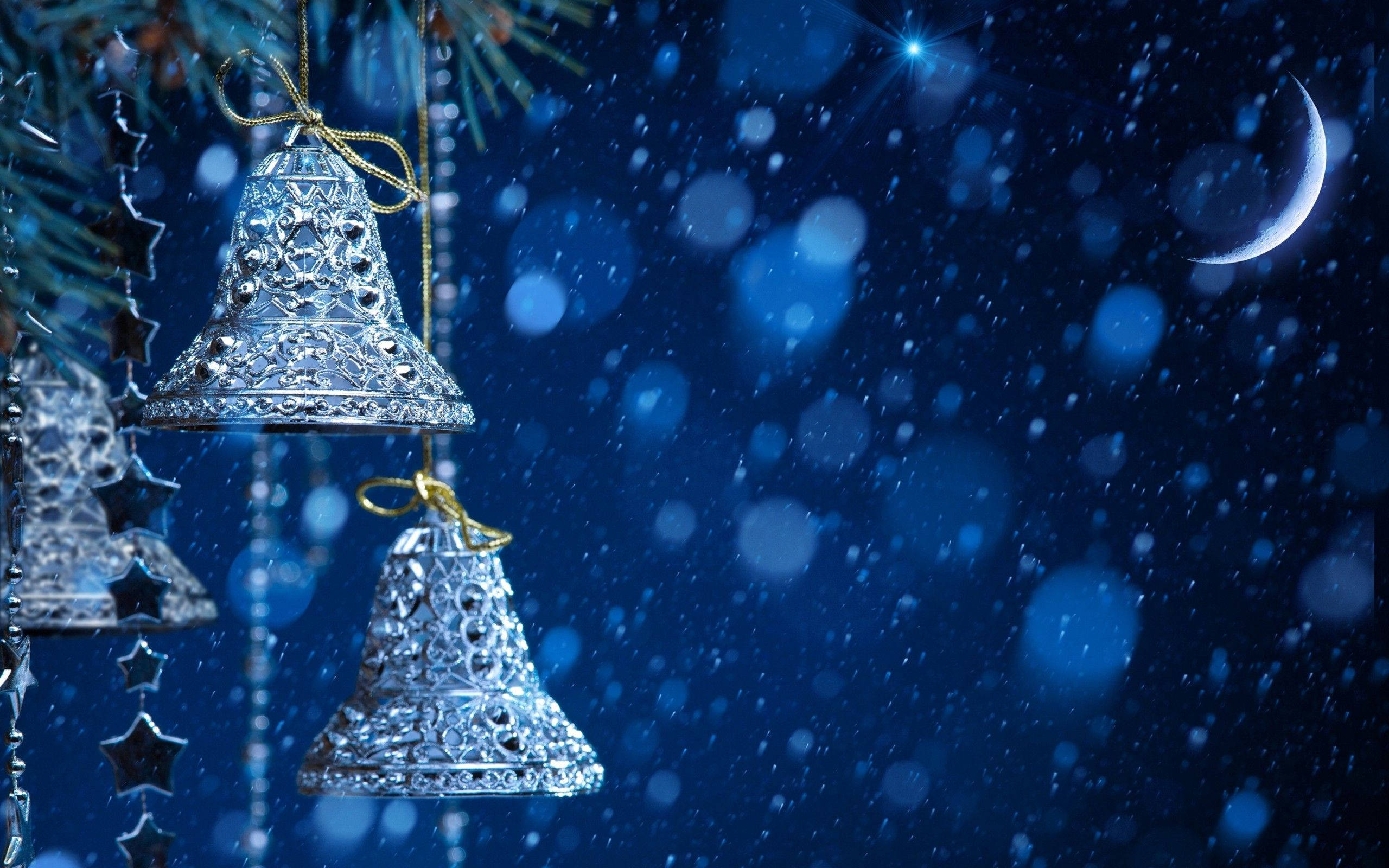 silver embellished christmas bells, pine branches, snowy night sky, 2K Desktop Wallpaper