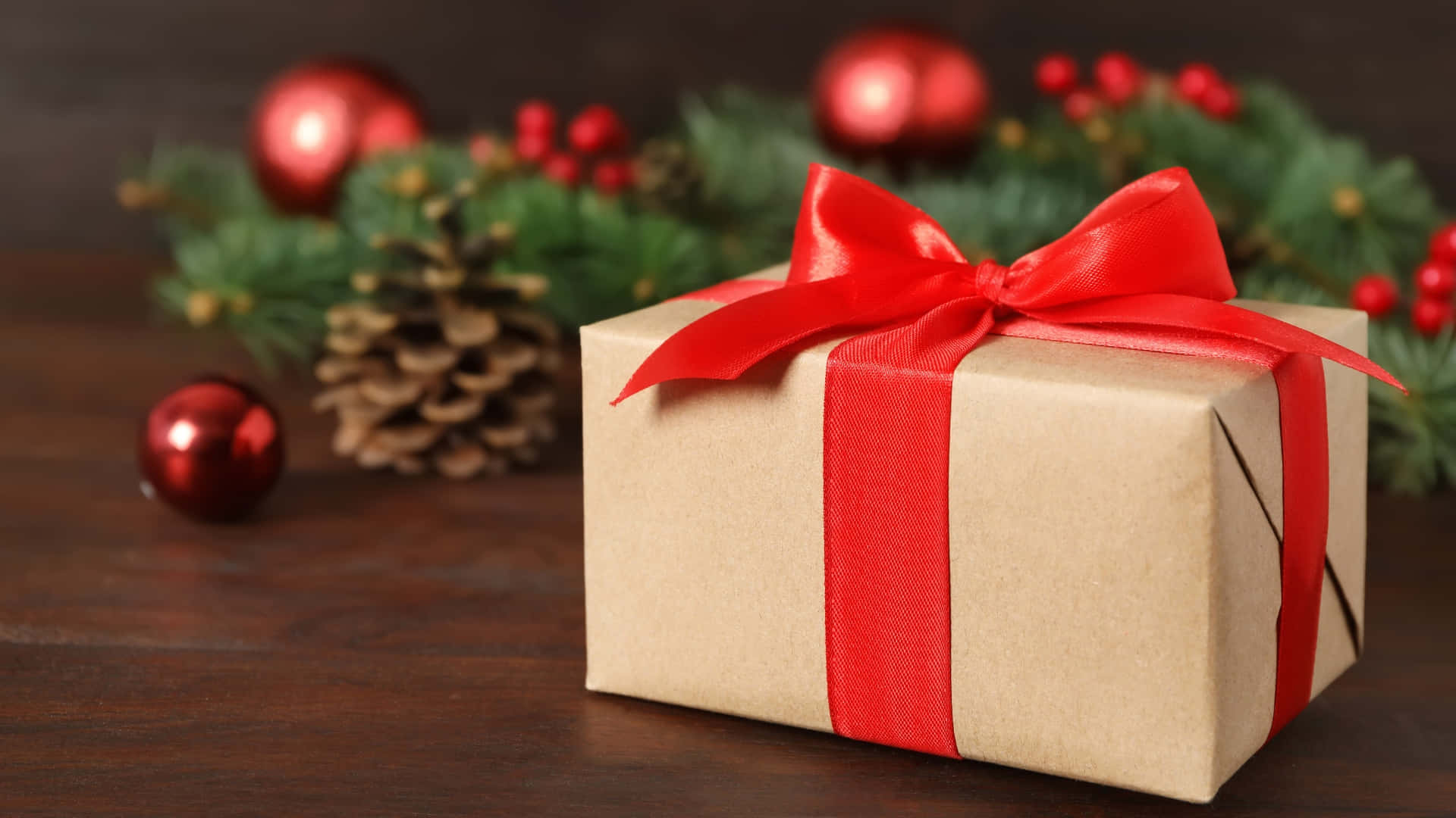brown paper gift box, bright red ribbon, wooden table, Full HD Desktop Wallpaper